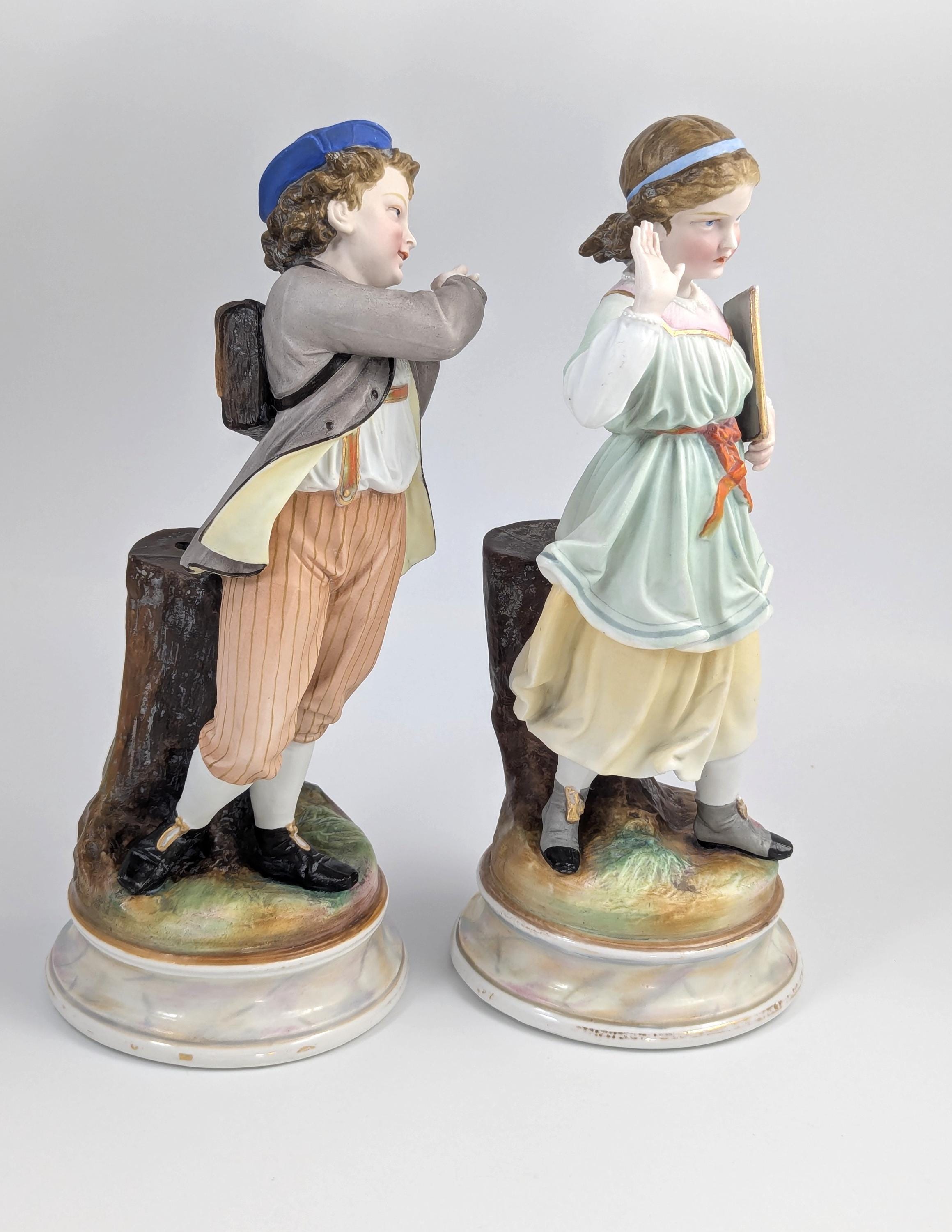 A Pair of Bisque Porcelain Figurines, France, 19th century.