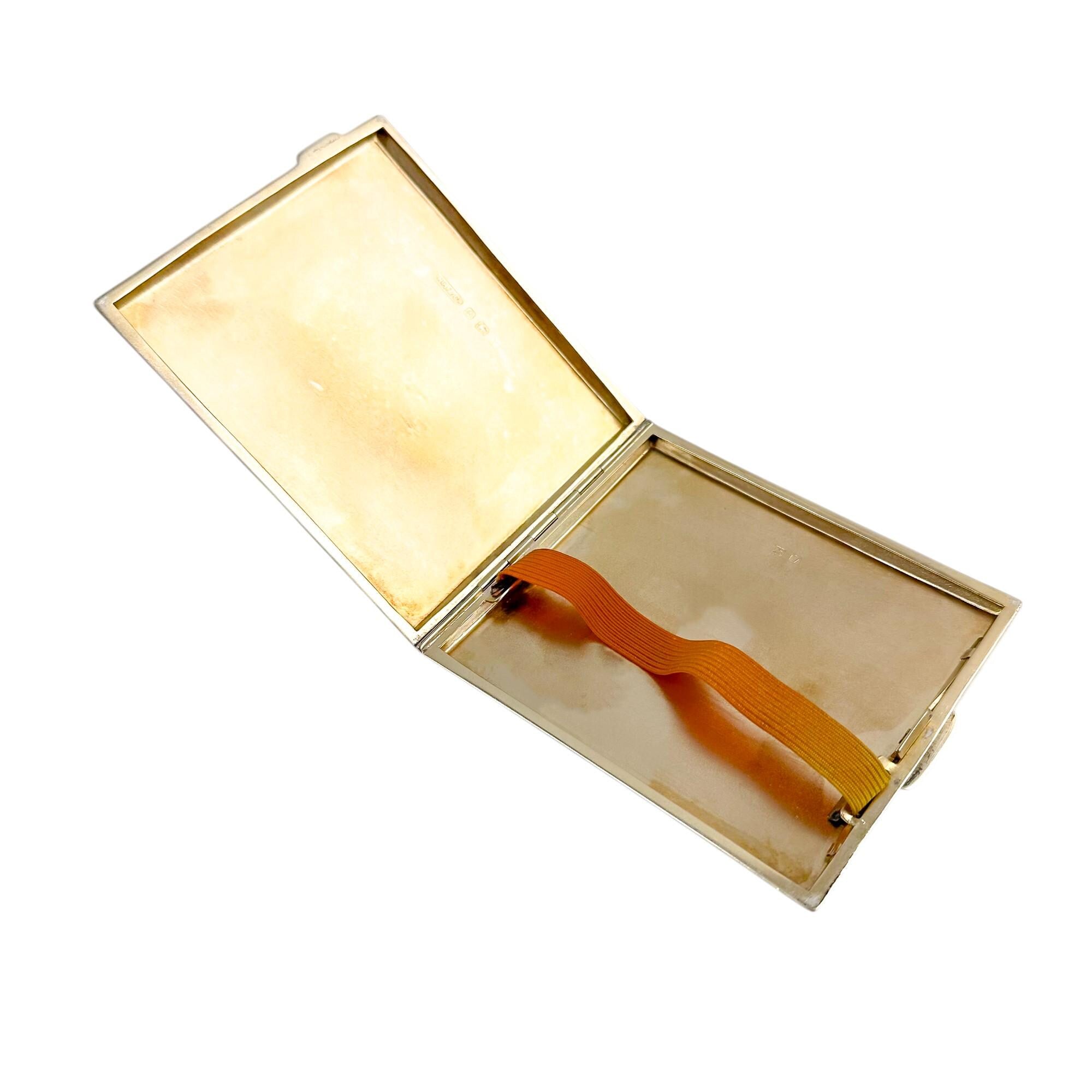 Large gilt sterling silver WWII cigarette case with engine-turned design, 130 g