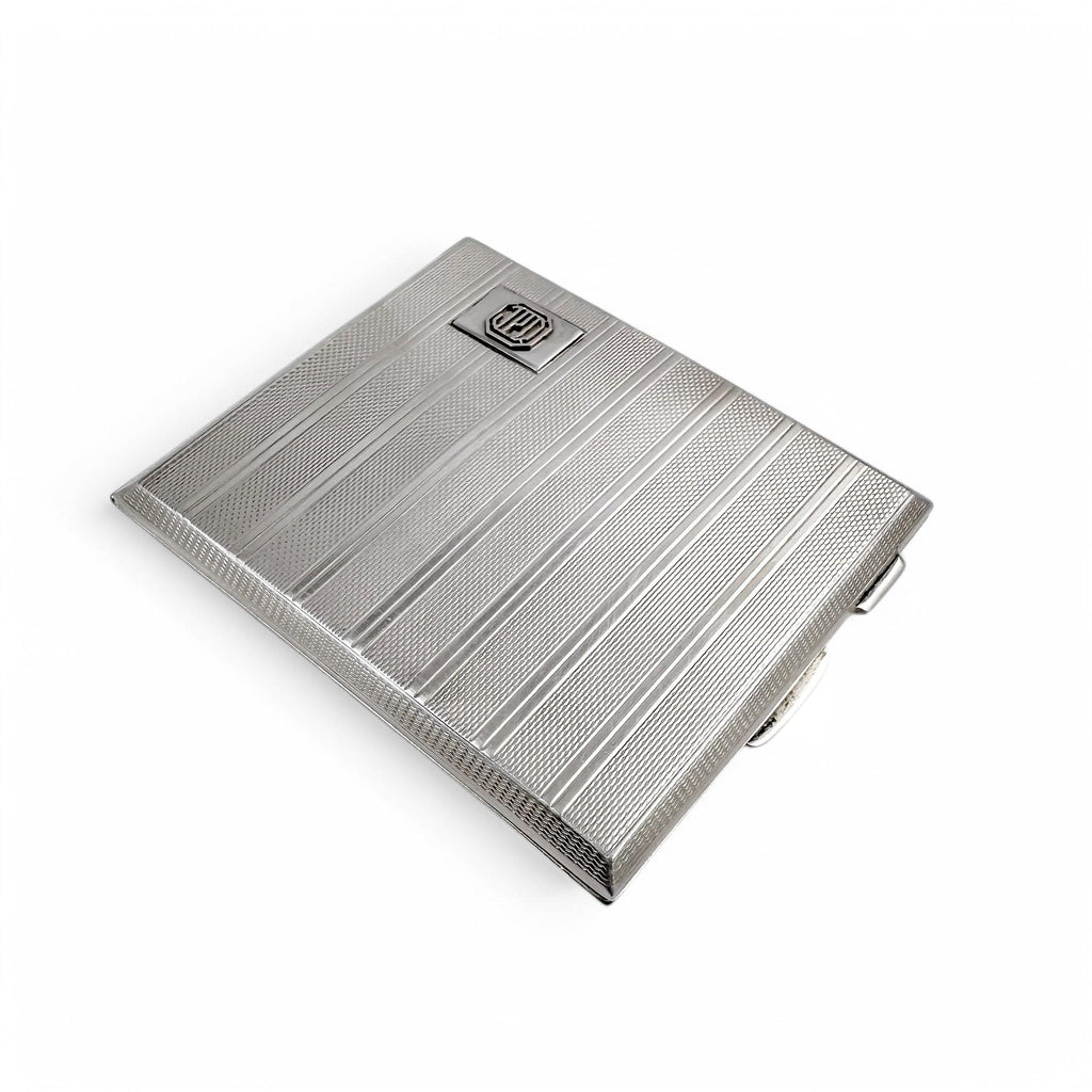 Large gilt sterling silver WWII cigarette case with engine-turned design, 130 g
