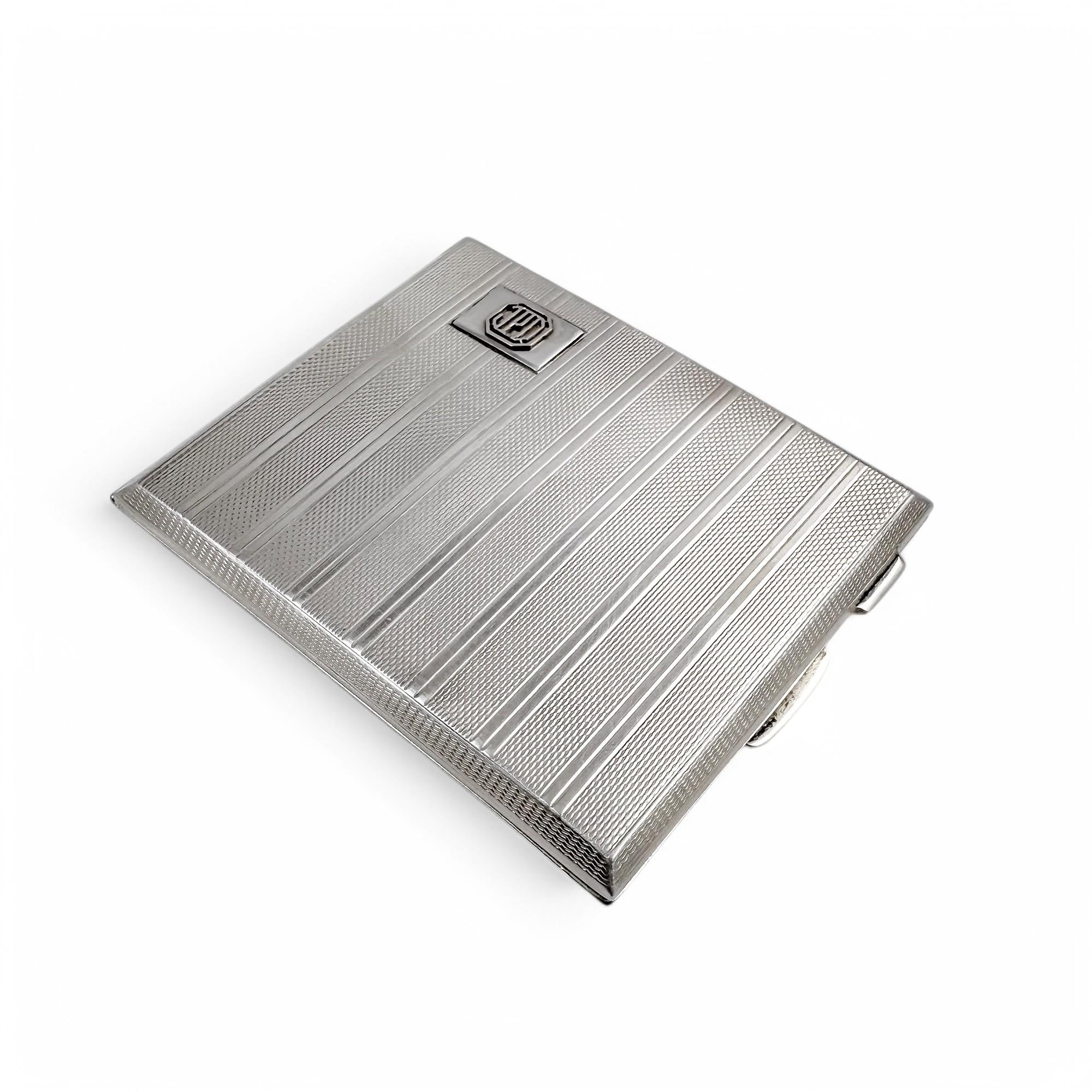 Large gilt sterling silver WWII cigarette case with engine-turned design, 130 g