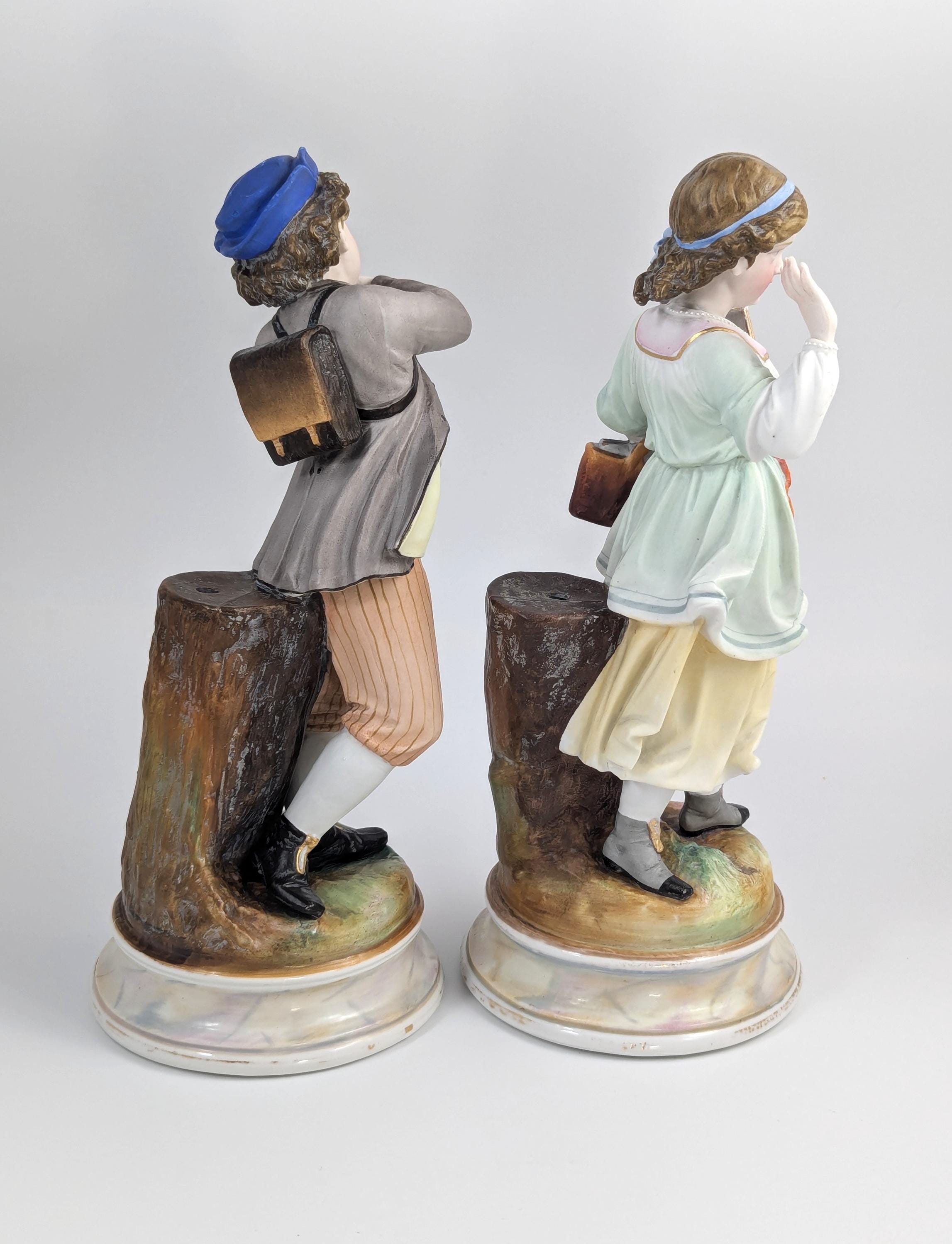 A Pair of Bisque Porcelain Figurines, France, 19th century.