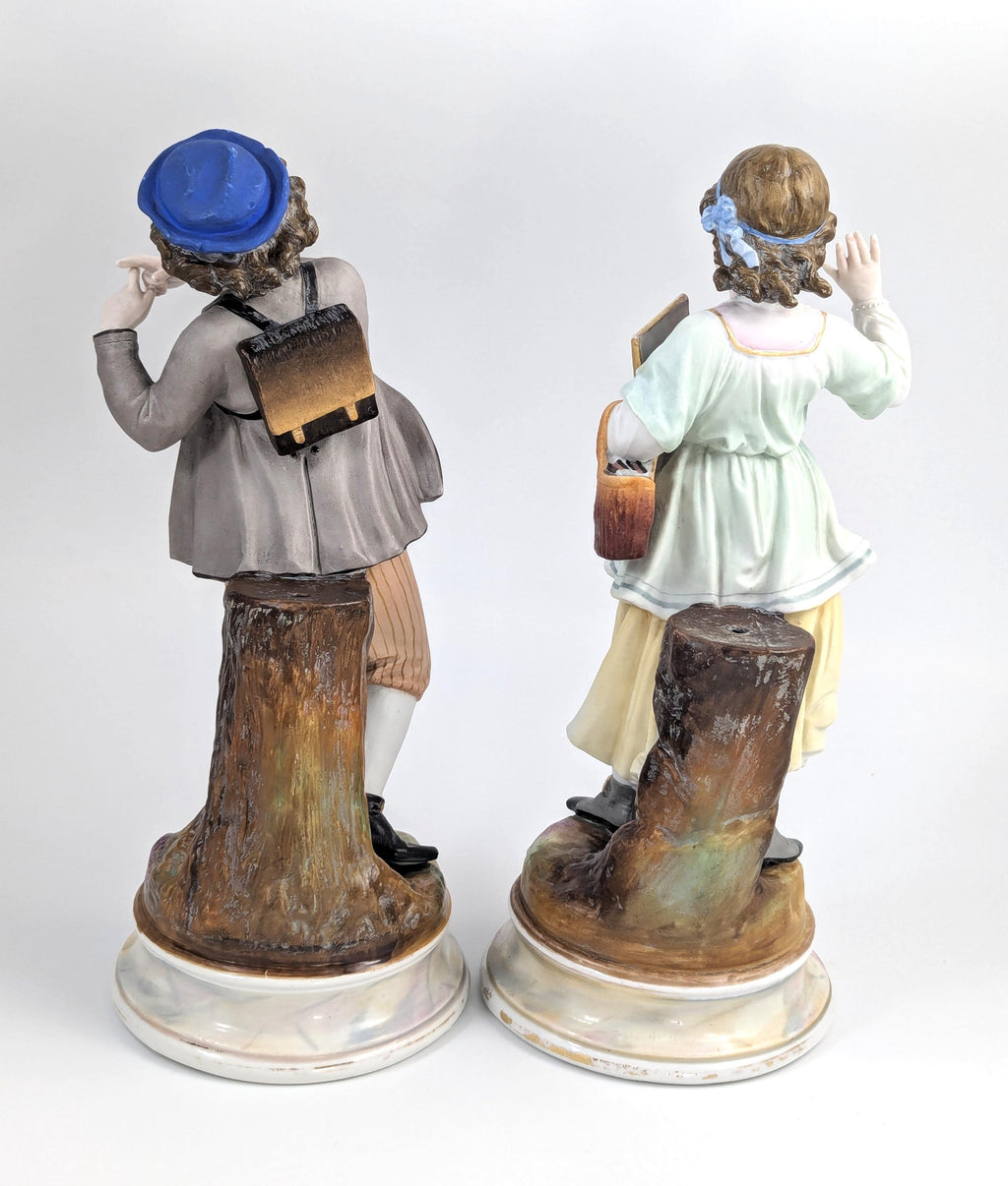 A Pair of Bisque Porcelain Figurines, France, 19th century.