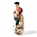 Antique French Porcelain Figurine: Flute Player with Cat, Early 19th Century