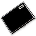 Art Deco sterling silver and black enamel cigarette case, marcasite front, engine-turned reverse, Goldsmiths & Silversmiths Co, 1932