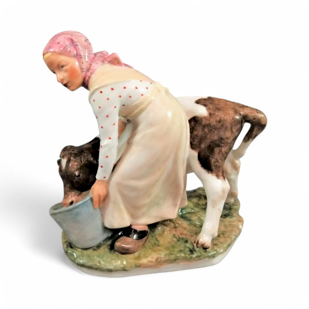 Royal Copenhagen Porcelain Figurine: Girl with Calf, Juliane Marie Polychrome