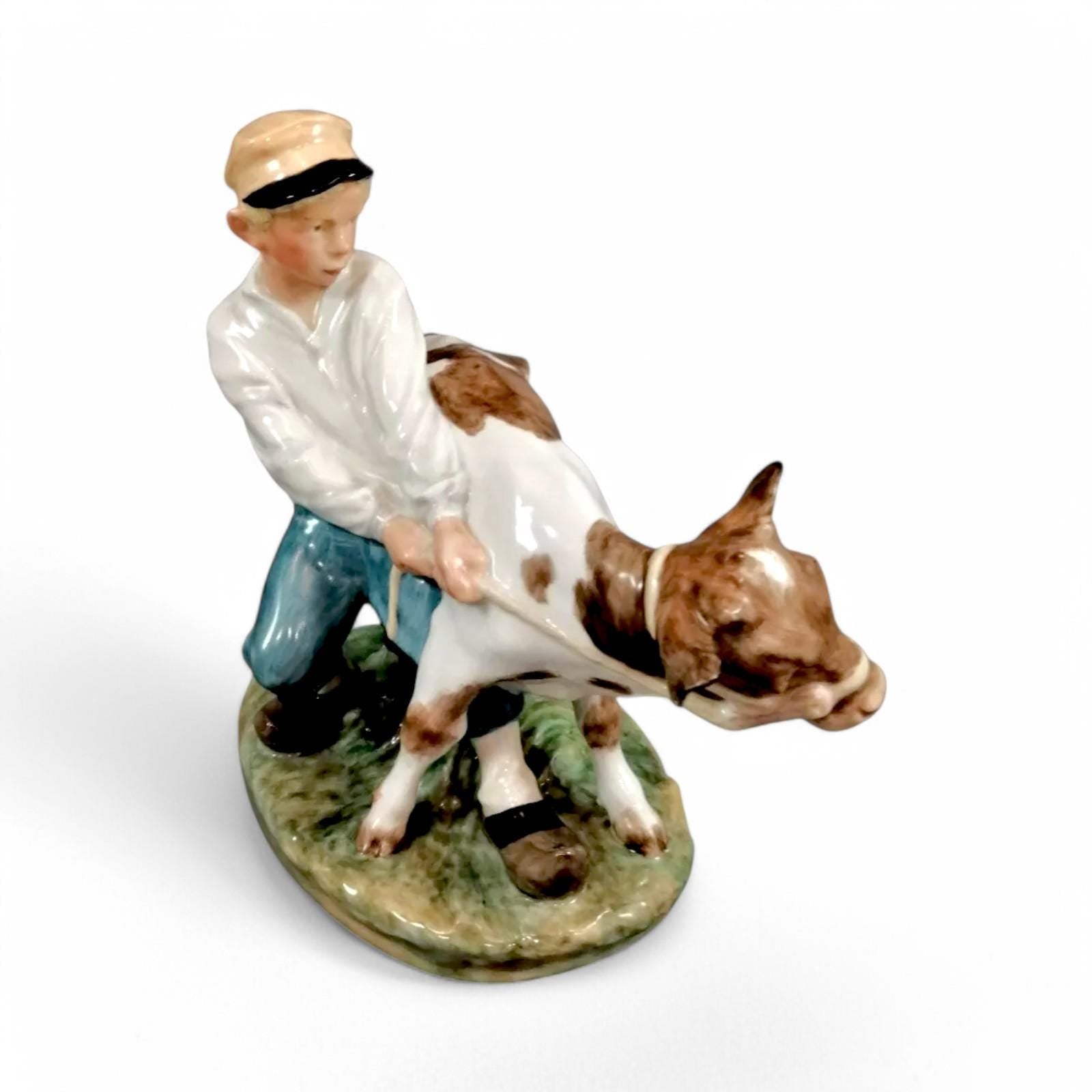 Royal Copenhagen Porcelain Figurine: Boy with Calf, Juliane Marie Design