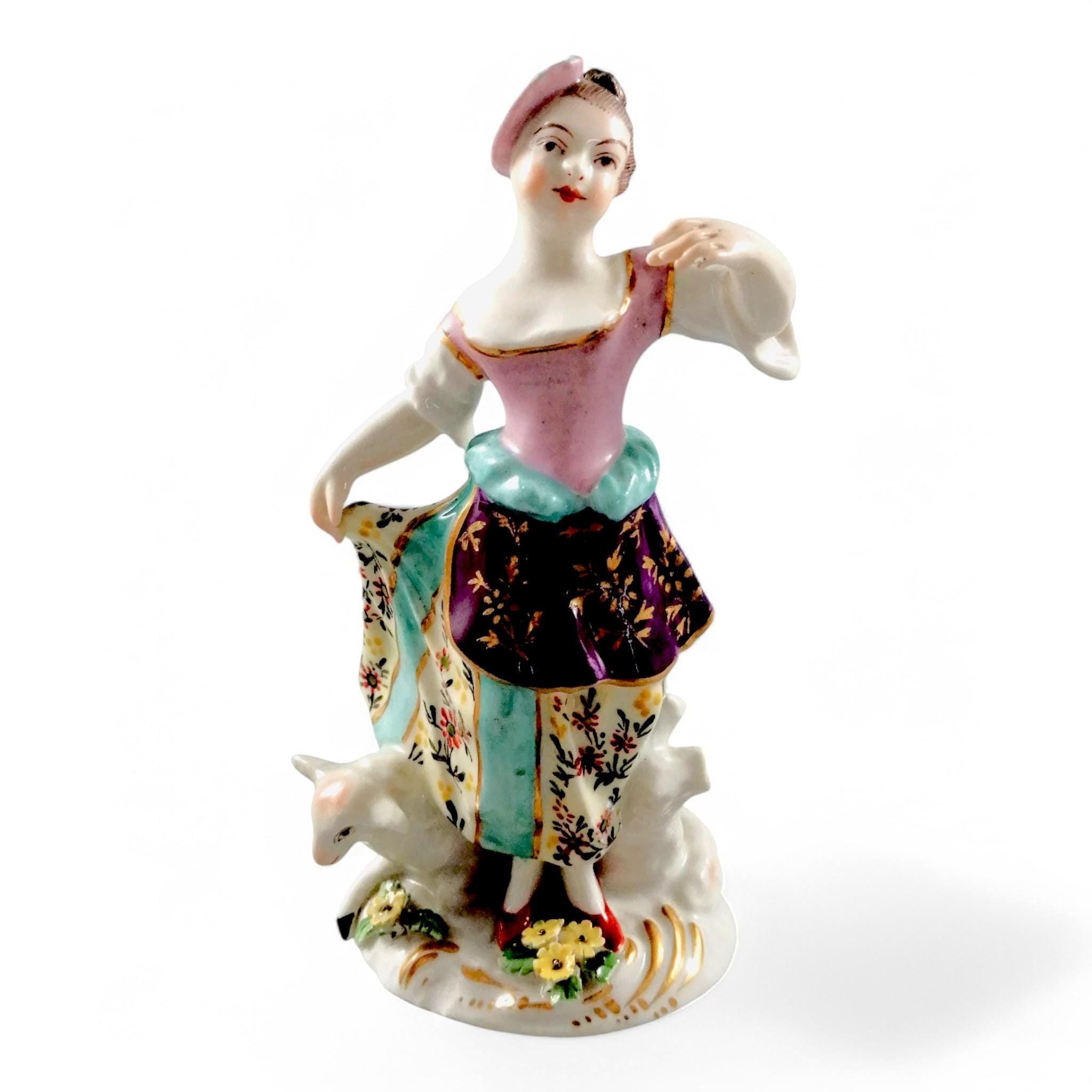 Possibly Chelsea porcelain figurine of young woman shepherdess, gold anchor mark, c. 1820