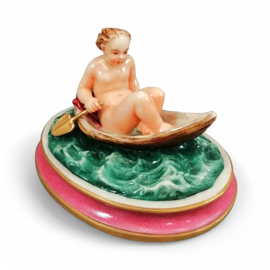 Antique majolica pottery figurine, nude girl in a boat, rare pink-base figure, Minton or French style, gilded oar, 12.8 cm
