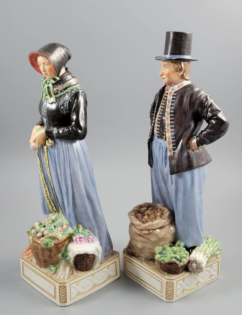 Royal Copenhagen Pair of Amager Market Costume Figures 12102‑12103