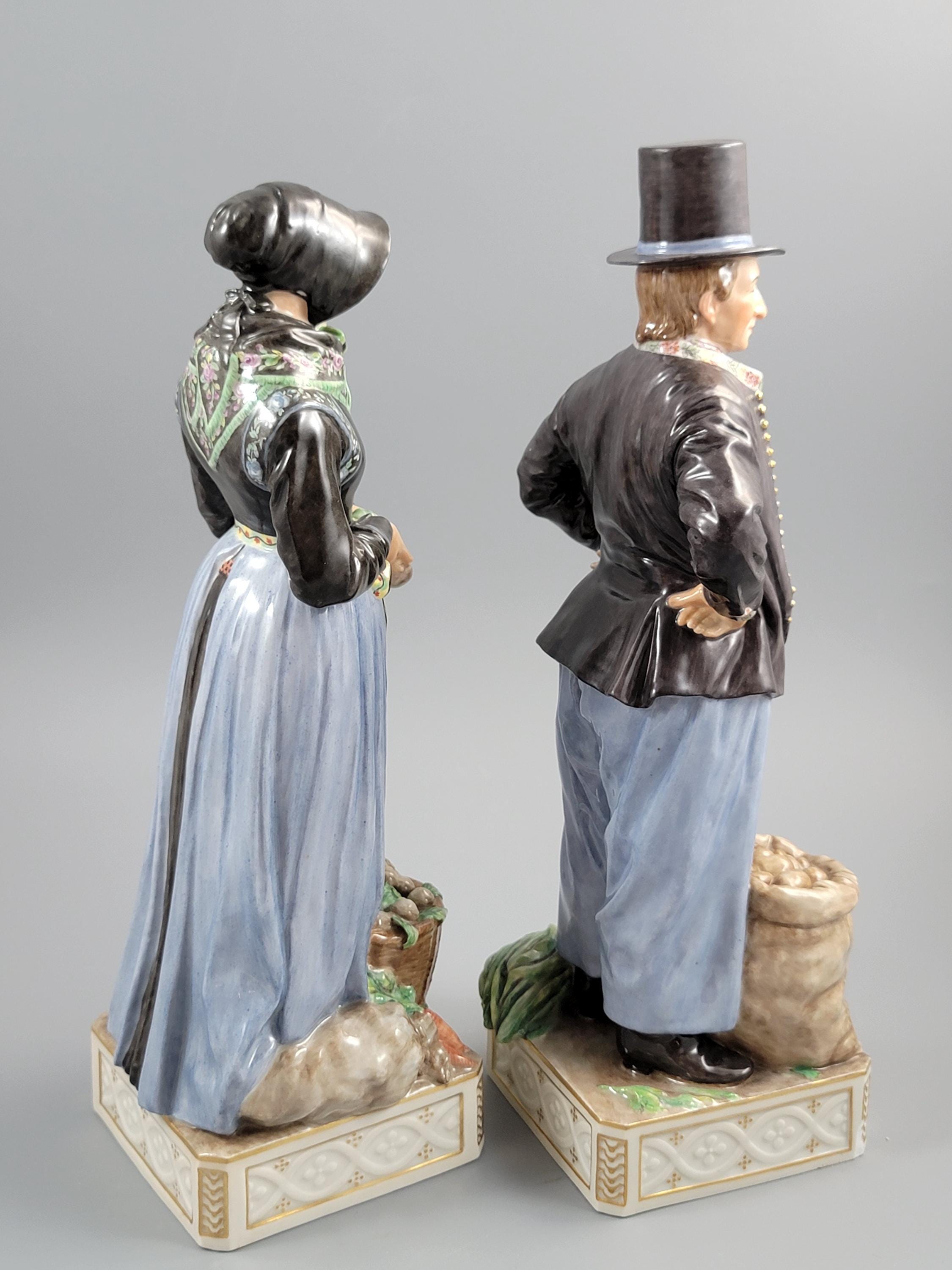 Royal Copenhagen Pair of Amager Market Costume Figures 12102‑12103