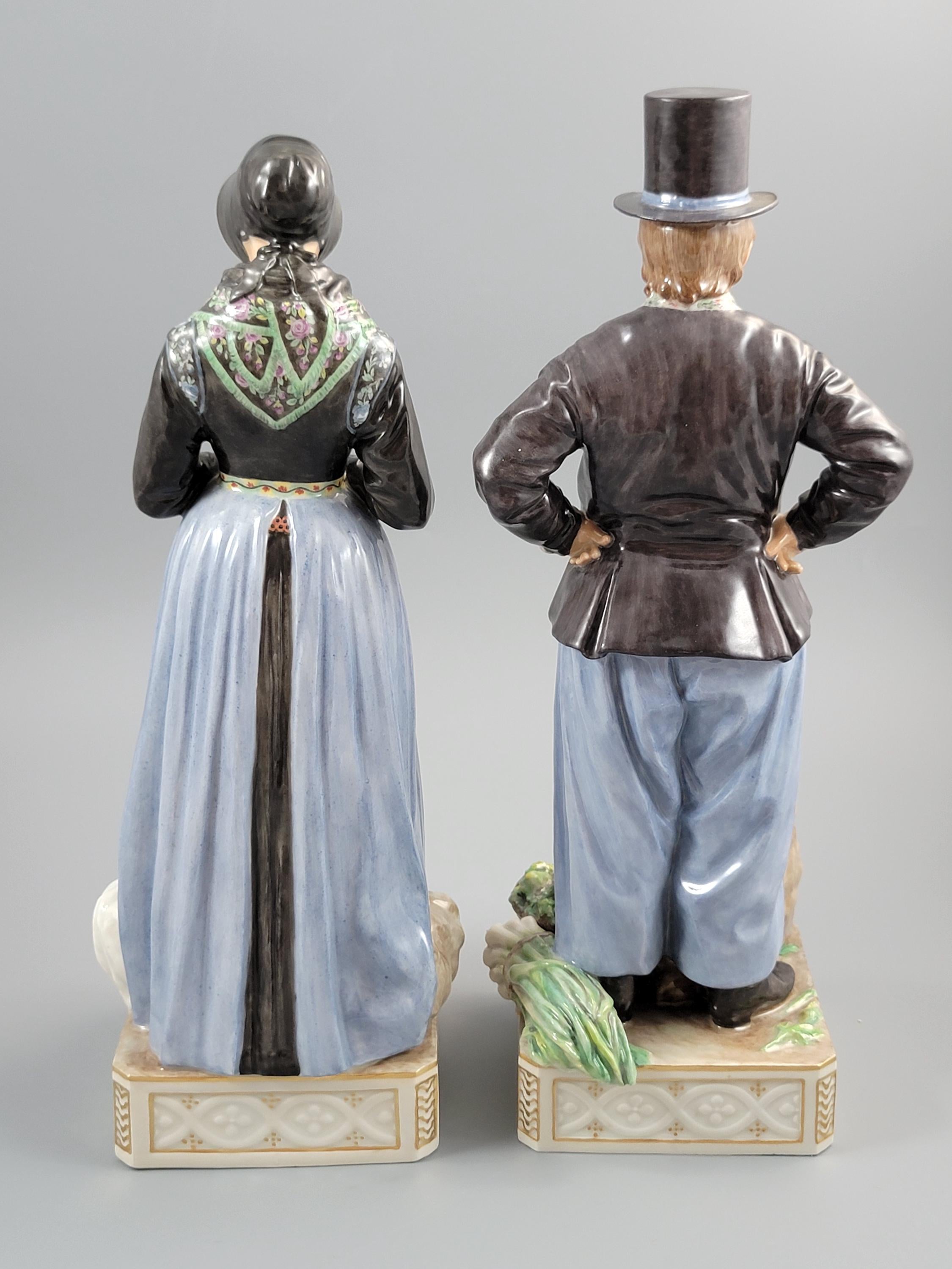 Royal Copenhagen Pair of Amager Market Costume Figures 12102‑12103