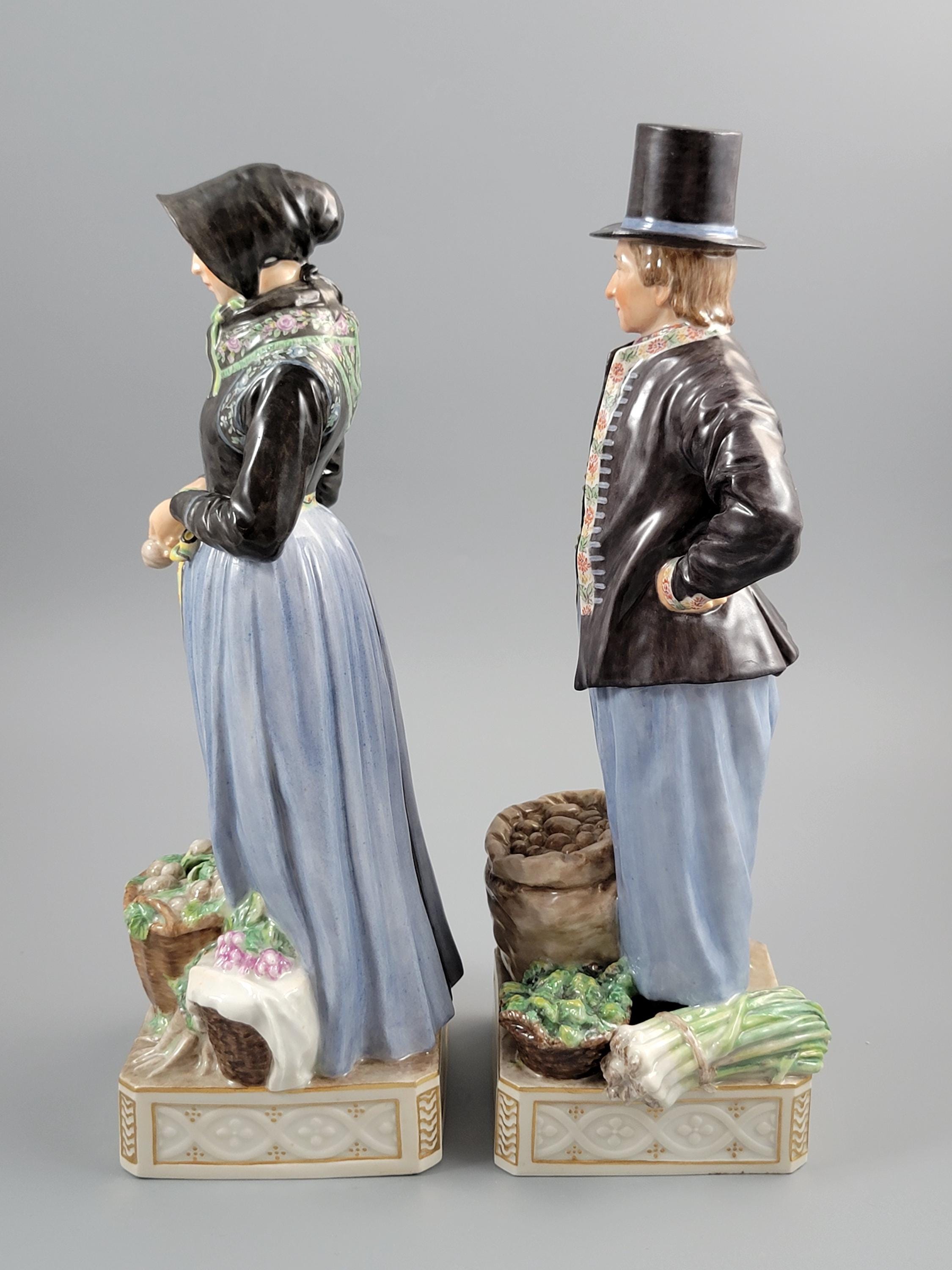 Royal Copenhagen Pair of Amager Market Costume Figures 12102‑12103