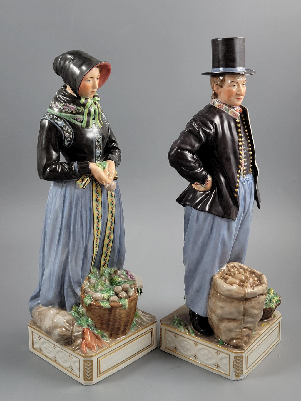 Royal Copenhagen Pair of Amager Market Costume Figures 12102‑12103