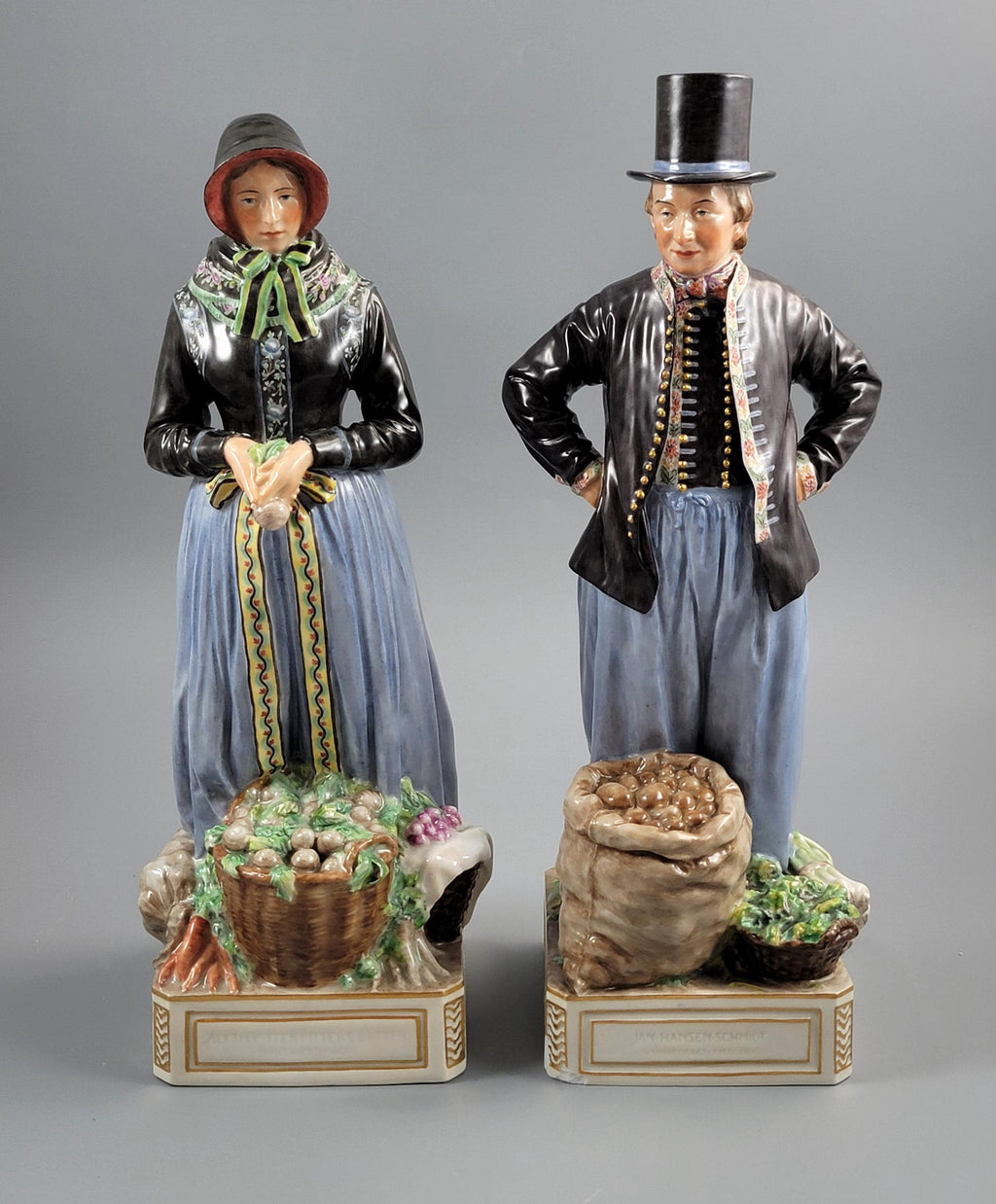 Royal Copenhagen Pair of Amager Market Costume Figures 12102‑12103