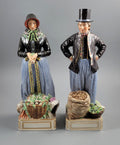 Royal Copenhagen Pair of Amager Market Costume Figures 12102‑12103
