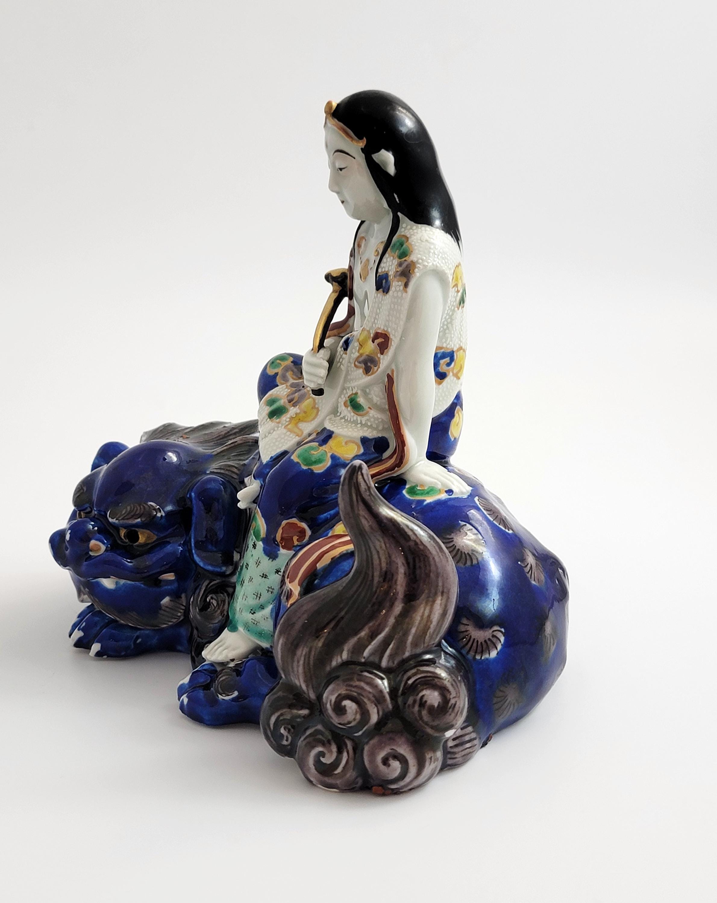 Kutani Porcelain Kannon on Shishi, Japan Meiji c.1870, Buddhist Goddess of Mercy, Hand-Painted