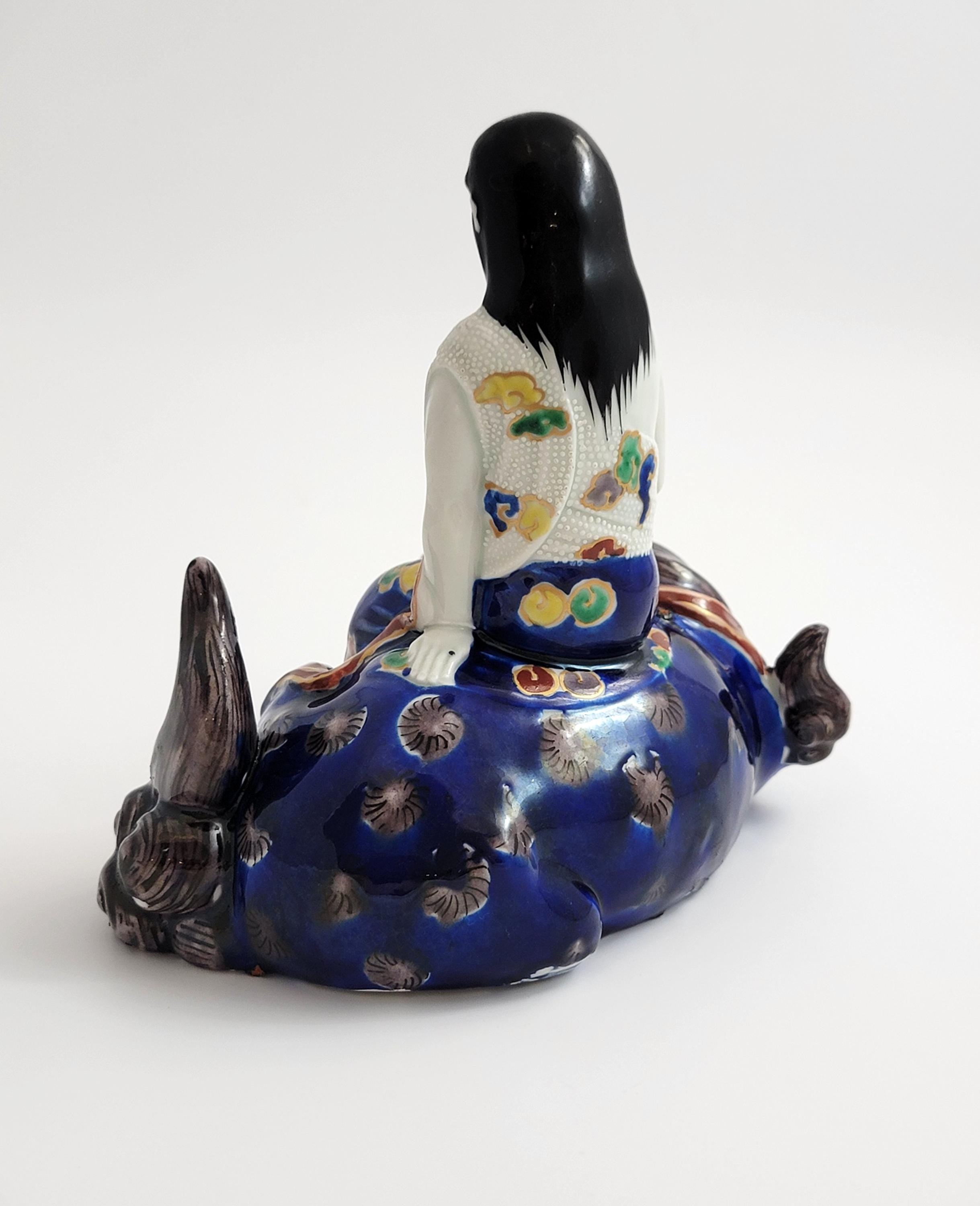Kutani Porcelain Kannon on Shishi, Japan Meiji c.1870, Buddhist Goddess of Mercy, Hand-Painted