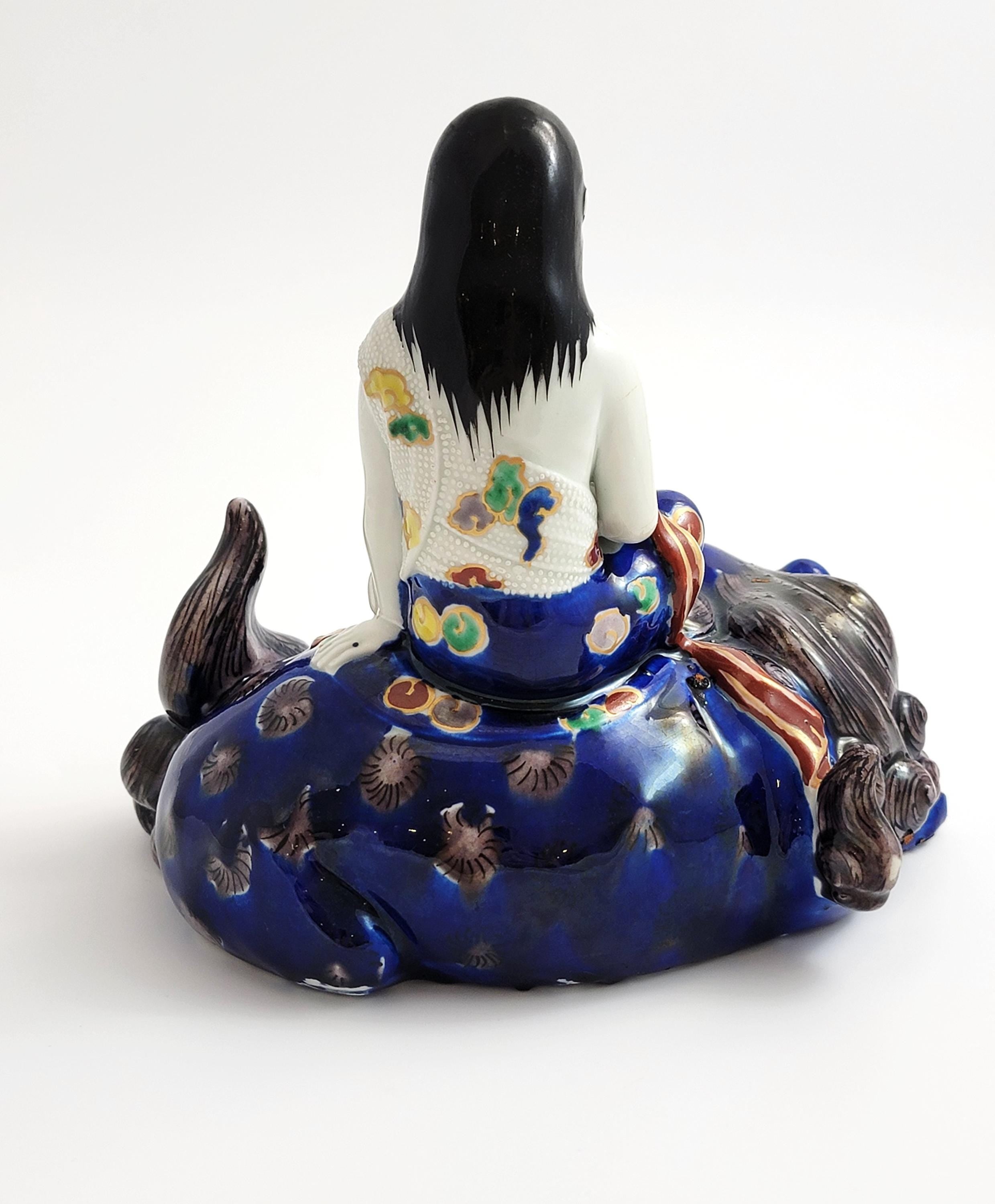 Kutani Porcelain Kannon on Shishi, Japan Meiji c.1870, Buddhist Goddess of Mercy, Hand-Painted