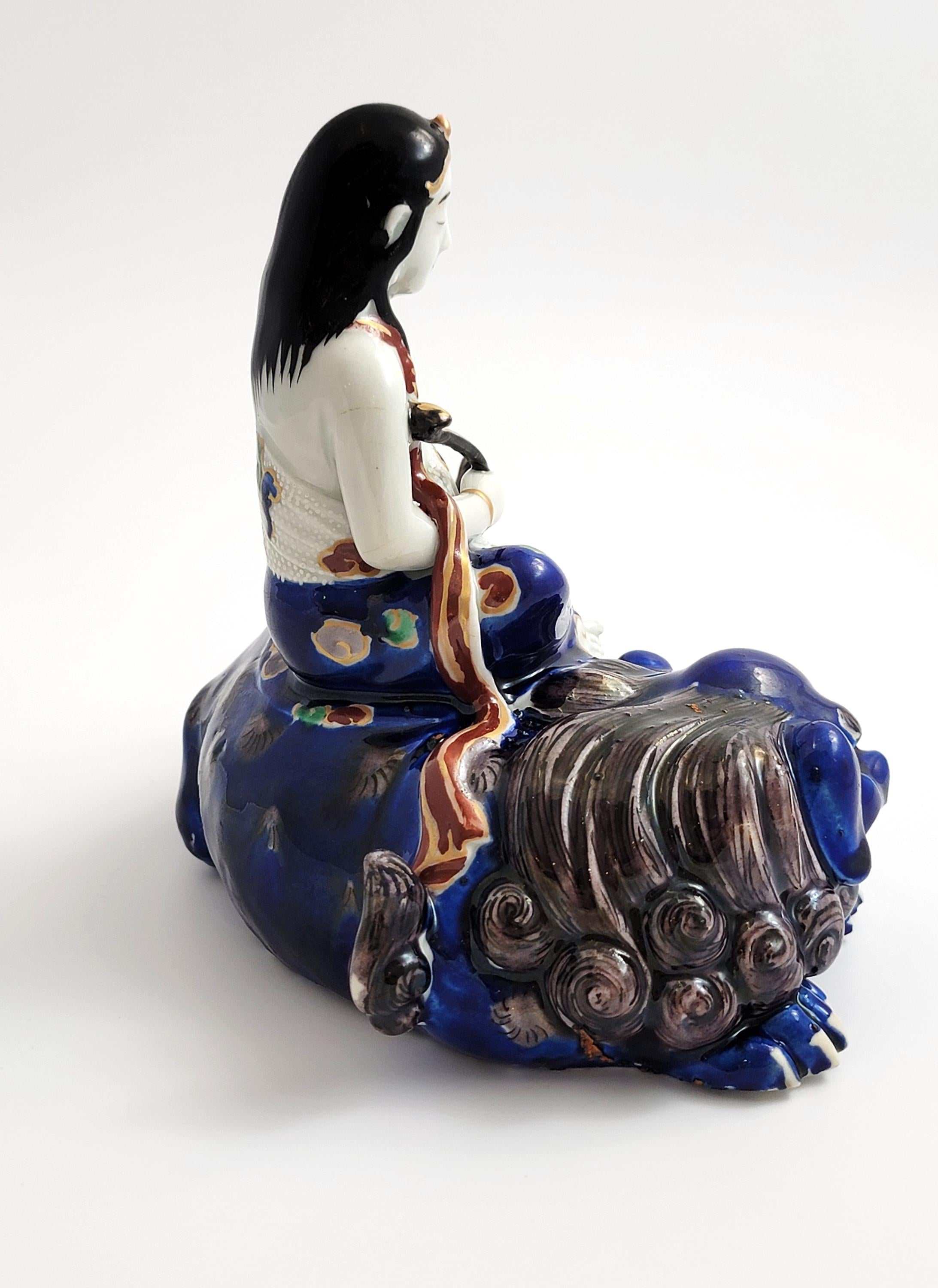 Kutani Porcelain Kannon on Shishi, Japan Meiji c.1870, Buddhist Goddess of Mercy, Hand-Painted