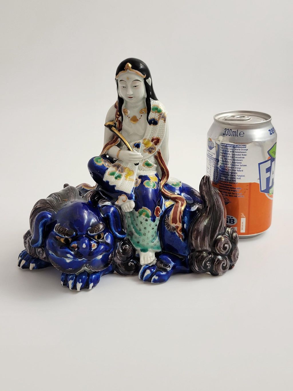Kutani Porcelain Kannon on Shishi, Japan Meiji c.1870, Buddhist Goddess of Mercy, Hand-Painted