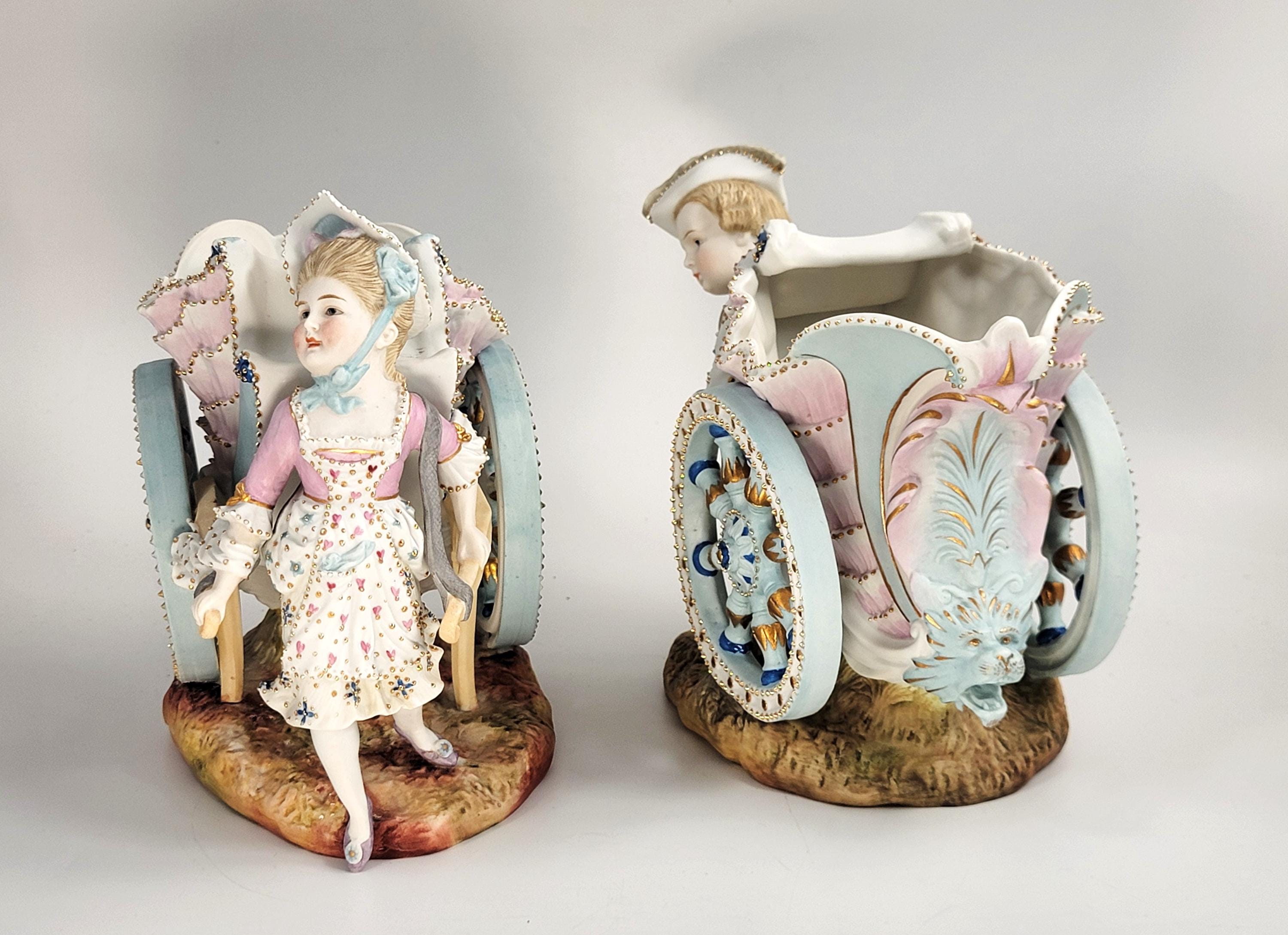 Kister, Scheibe-Alsbach (Thuringia), Pair of Porcelain Figural Flower Carts,c.1887