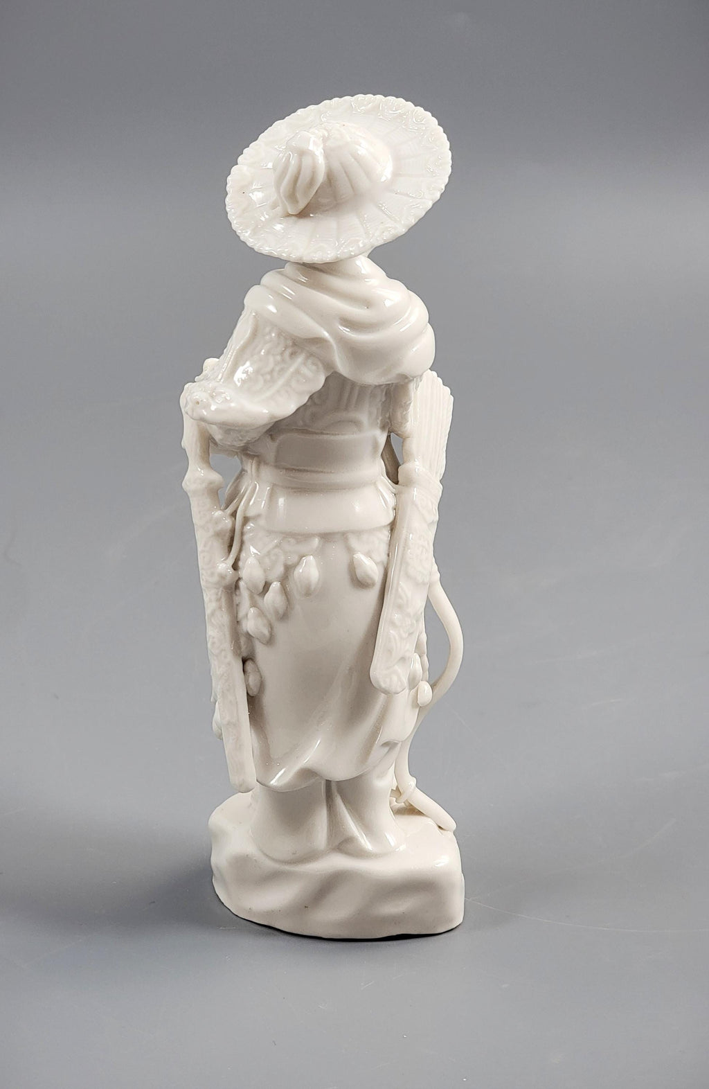Dehua Blanc de Chine Huntress (Female Archer) on Rocky Base, c.1890