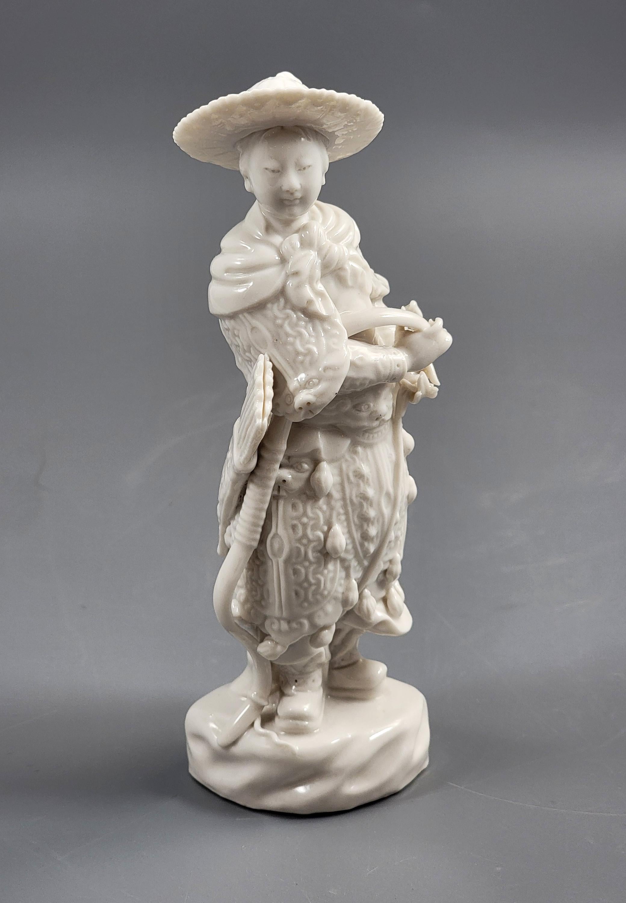 Dehua Blanc de Chine Huntress (Female Archer) on Rocky Base, c.1890