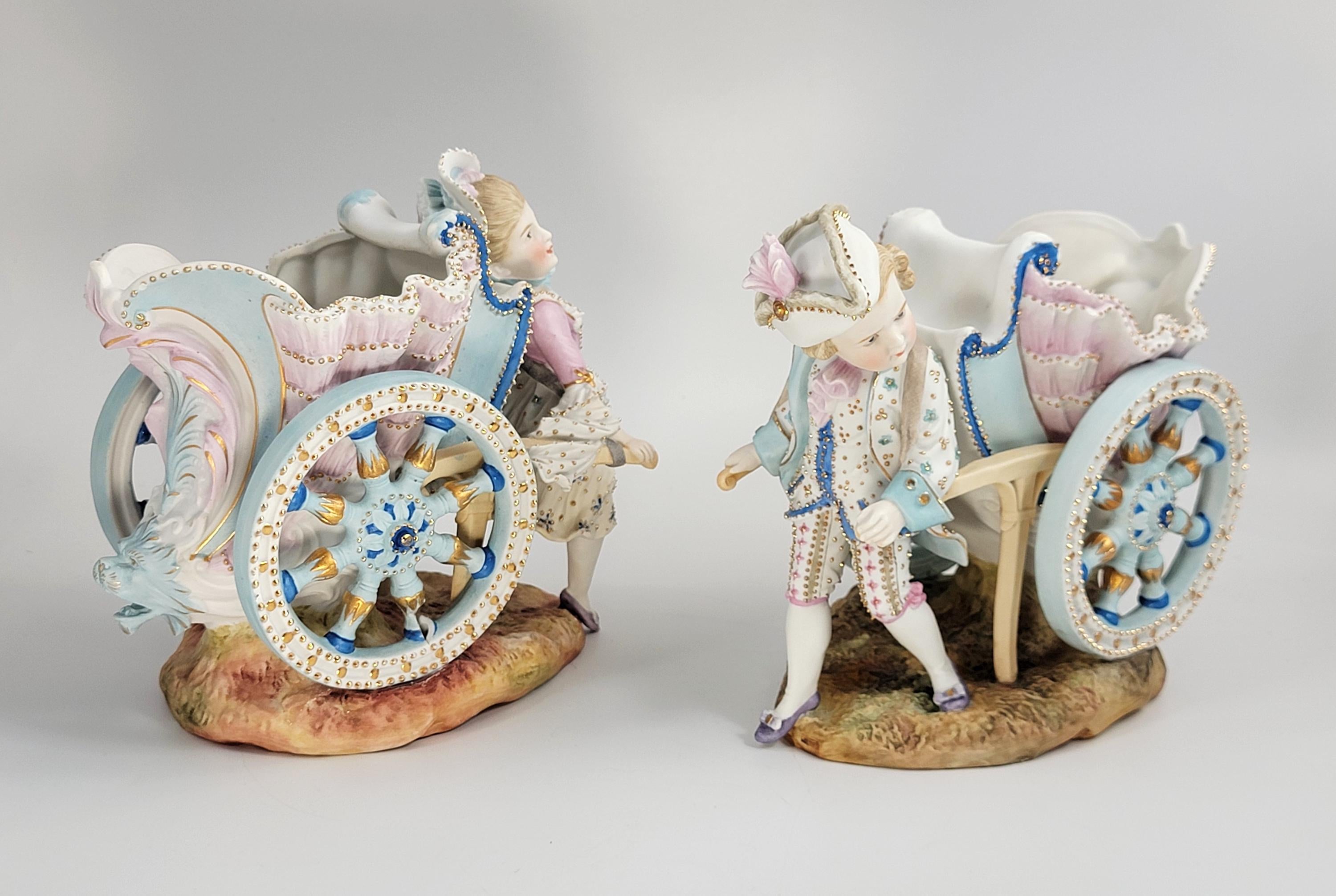 Kister, Scheibe-Alsbach (Thuringia), Pair of Porcelain Figural Flower Carts,c.1887