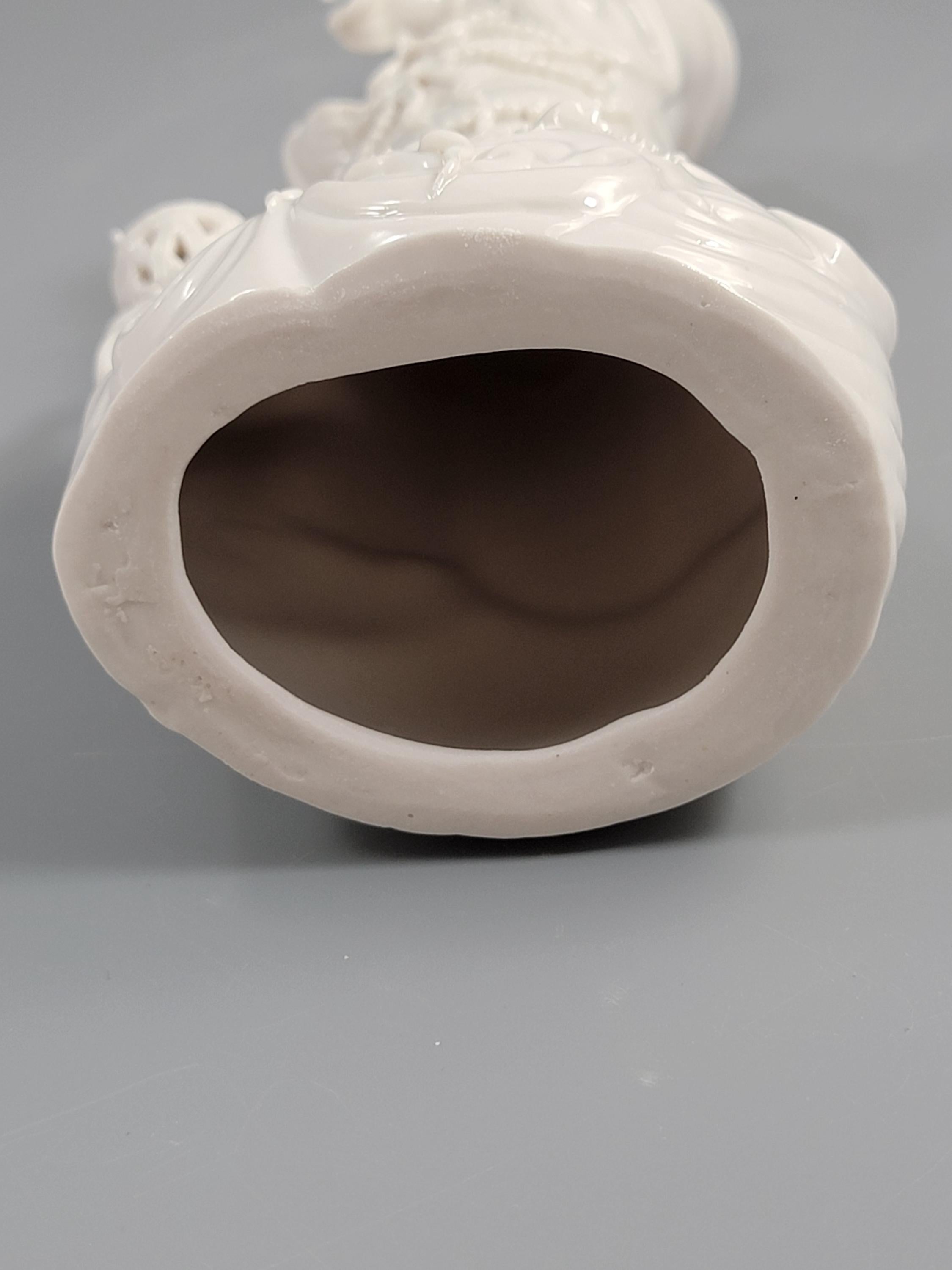 Dehua Blanc de Chine Guanyin with Fish Basket & Dragon Base, early 20th c