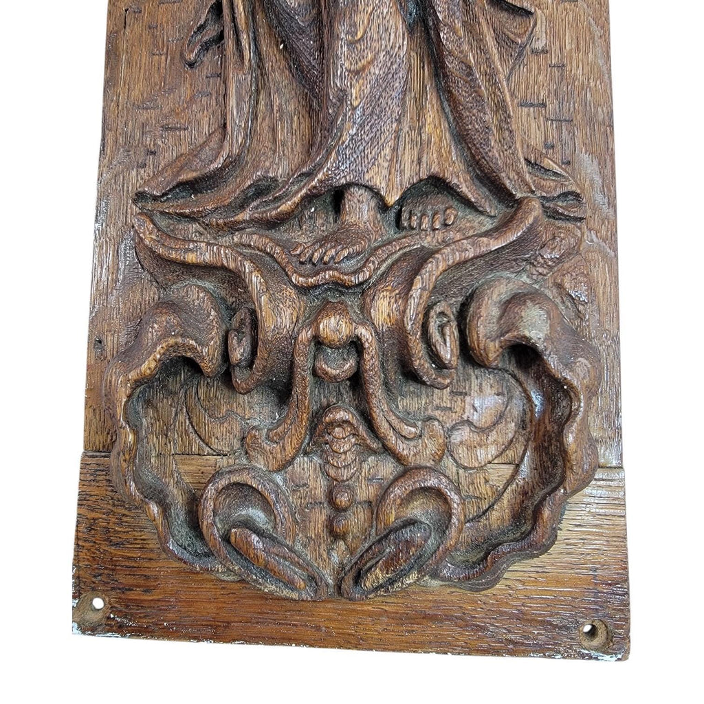 A Fine Flemish or German High Baroque Carved Oak Panel, Allegory of Faith, Late 17th Century