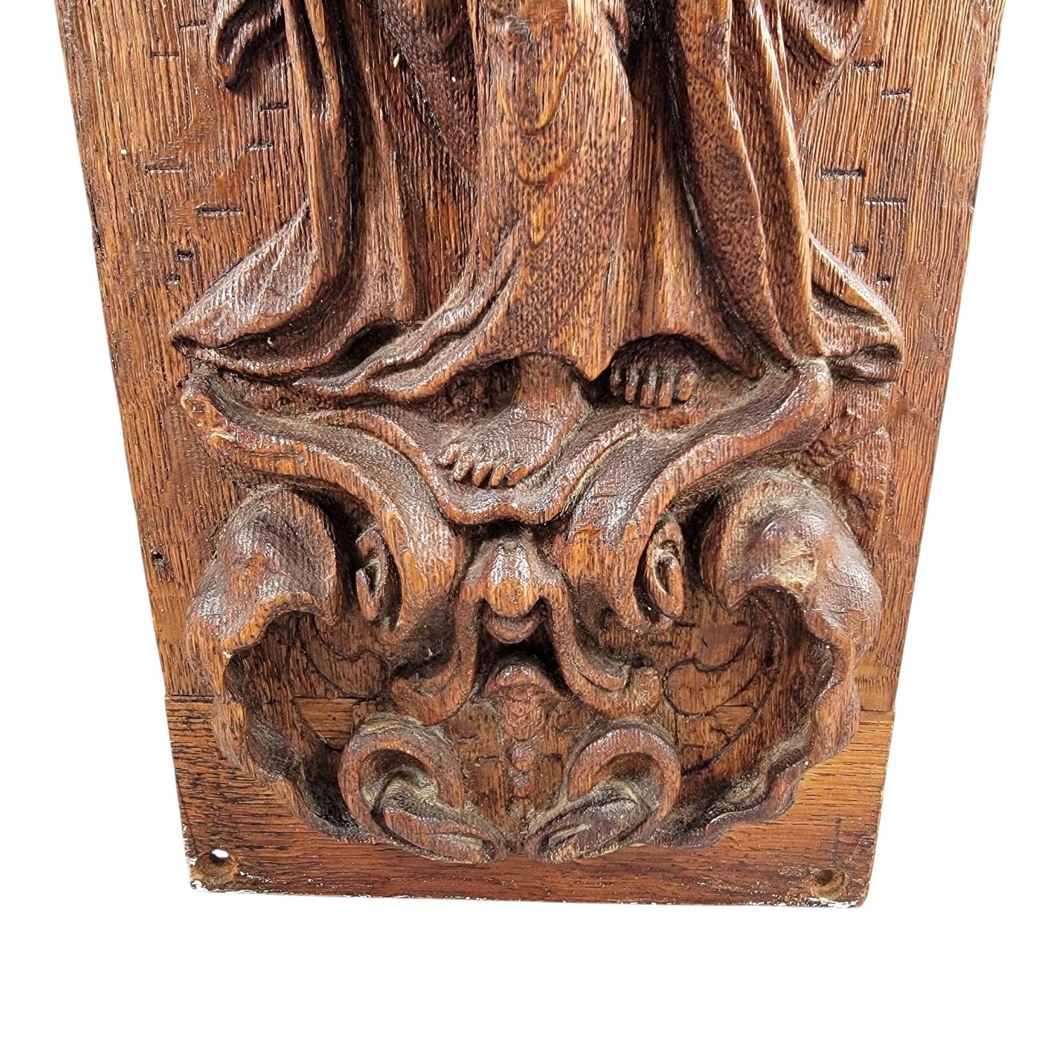 A Fine Flemish or German High Baroque Carved Oak Panel, Allegory of Faith, Late 17th Century