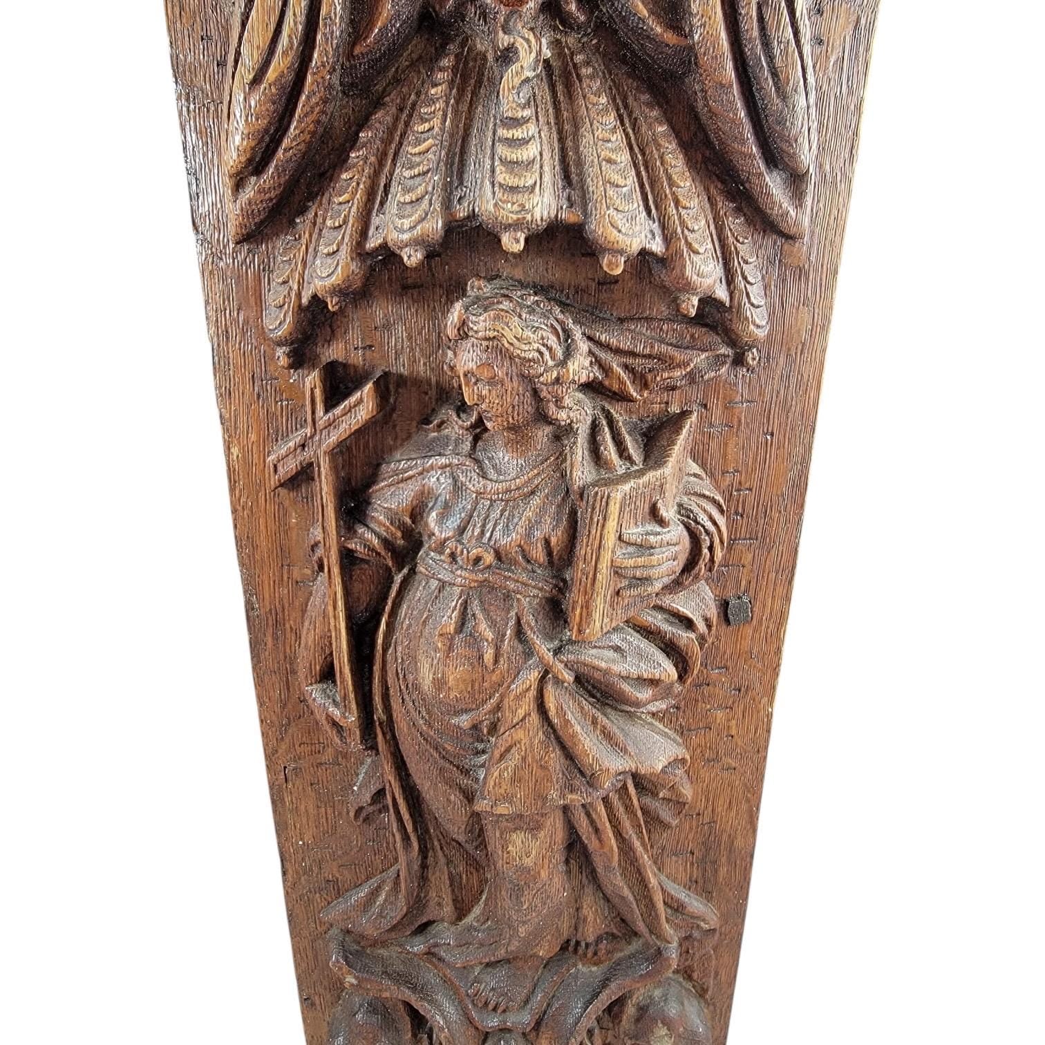 A Fine Flemish or German High Baroque Carved Oak Panel, Allegory of Faith, Late 17th Century