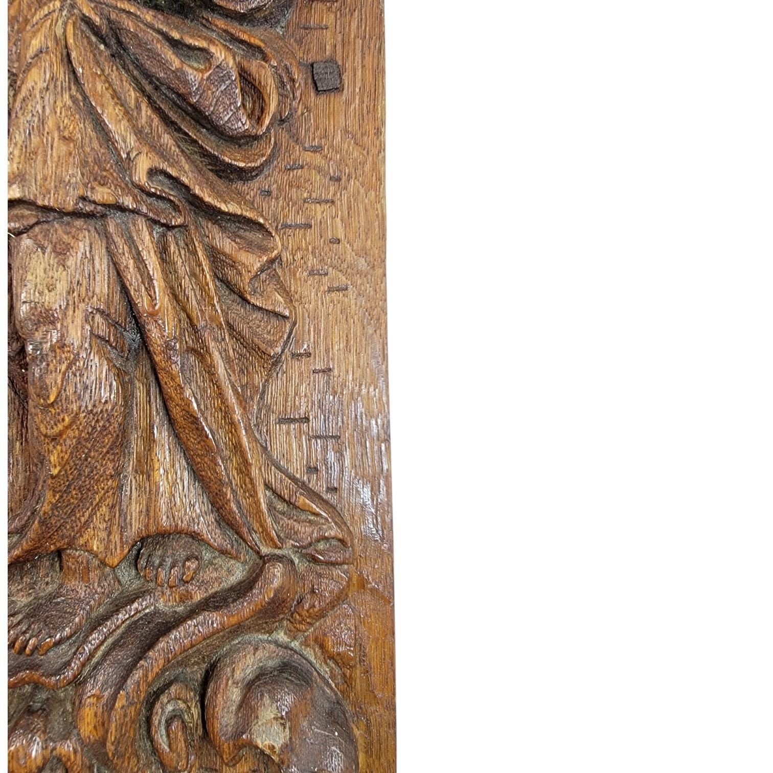 A Fine Flemish or German High Baroque Carved Oak Panel, Allegory of Faith, Late 17th Century