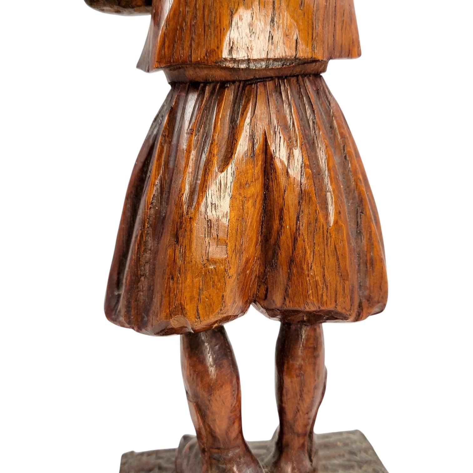 Antique Black Forest oak Pied Piper statue, 19th century German hand-carved folklore figure, detailed wood sculpture home decor