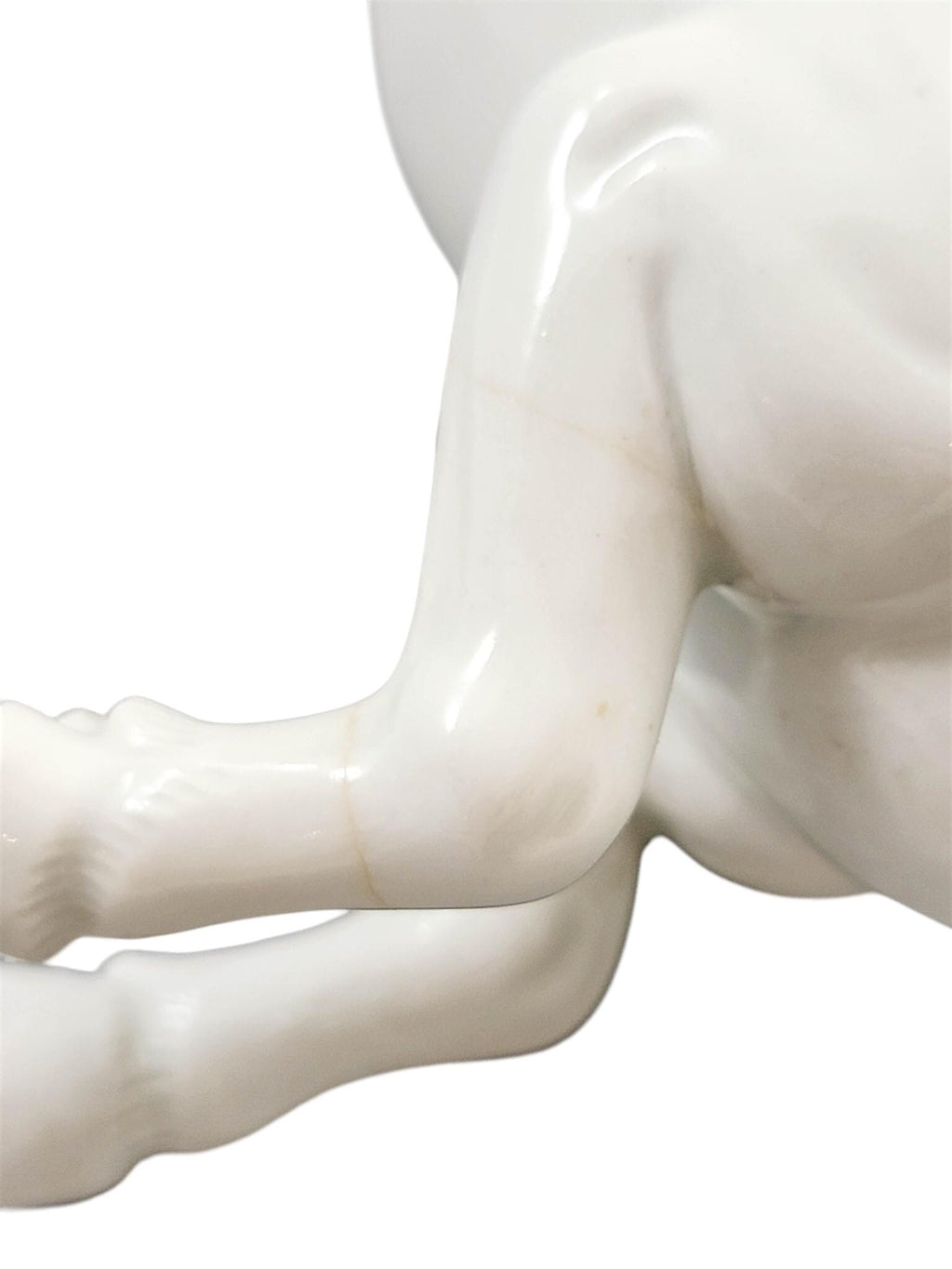Hirado porcelain recumbent horse figurine, Mikawachi kilns Japanese white glazed sculpture, late Edo to Meiji period