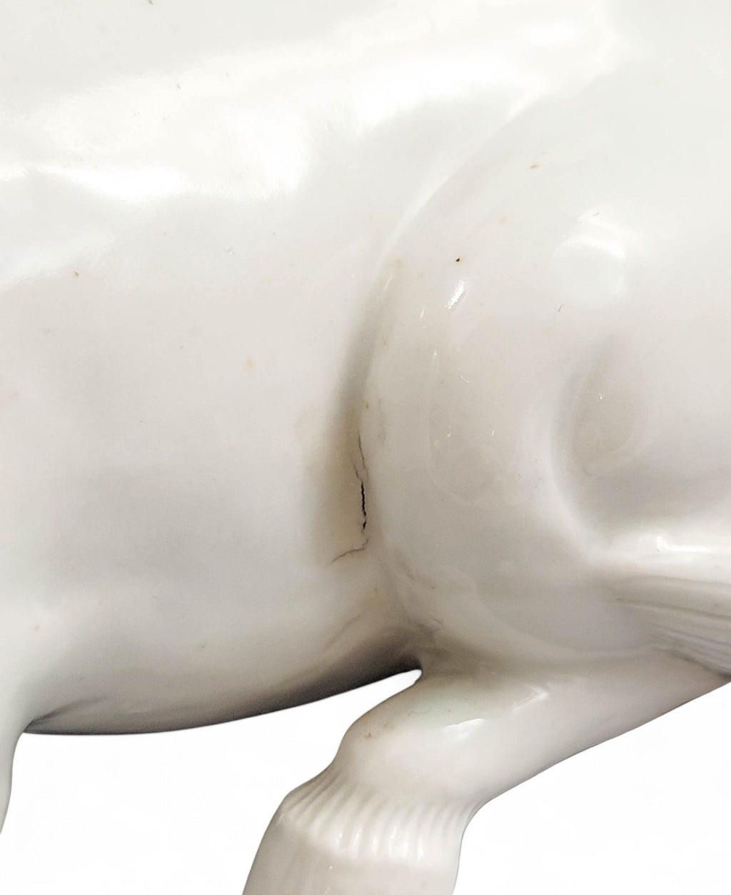 Hirado porcelain recumbent horse figurine, Mikawachi kilns Japanese white glazed sculpture, late Edo to Meiji period