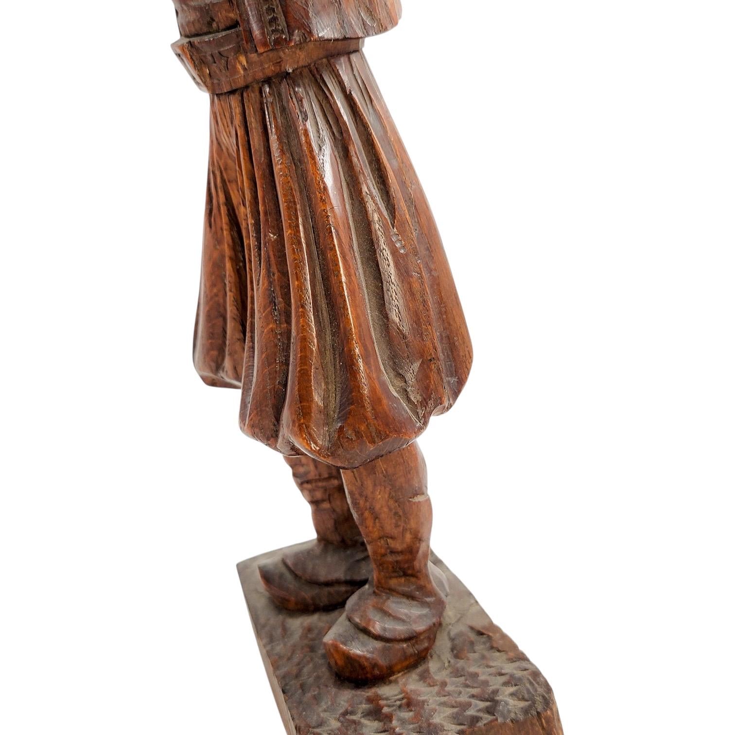 Antique Black Forest oak Pied Piper statue, 19th century German hand-carved folklore figure, detailed wood sculpture home decor
