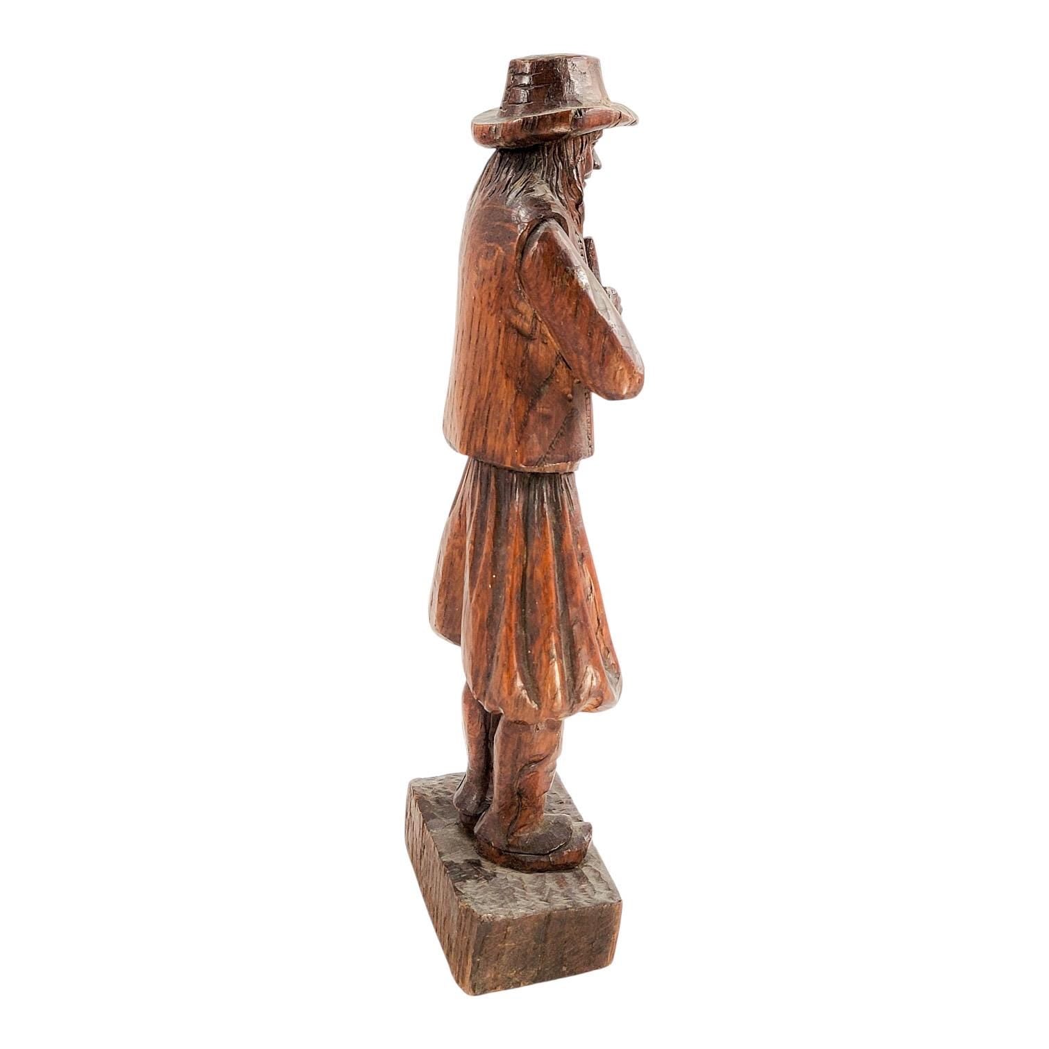 Antique Black Forest oak Pied Piper statue, 19th century German hand-carved folklore figure, detailed wood sculpture home decor