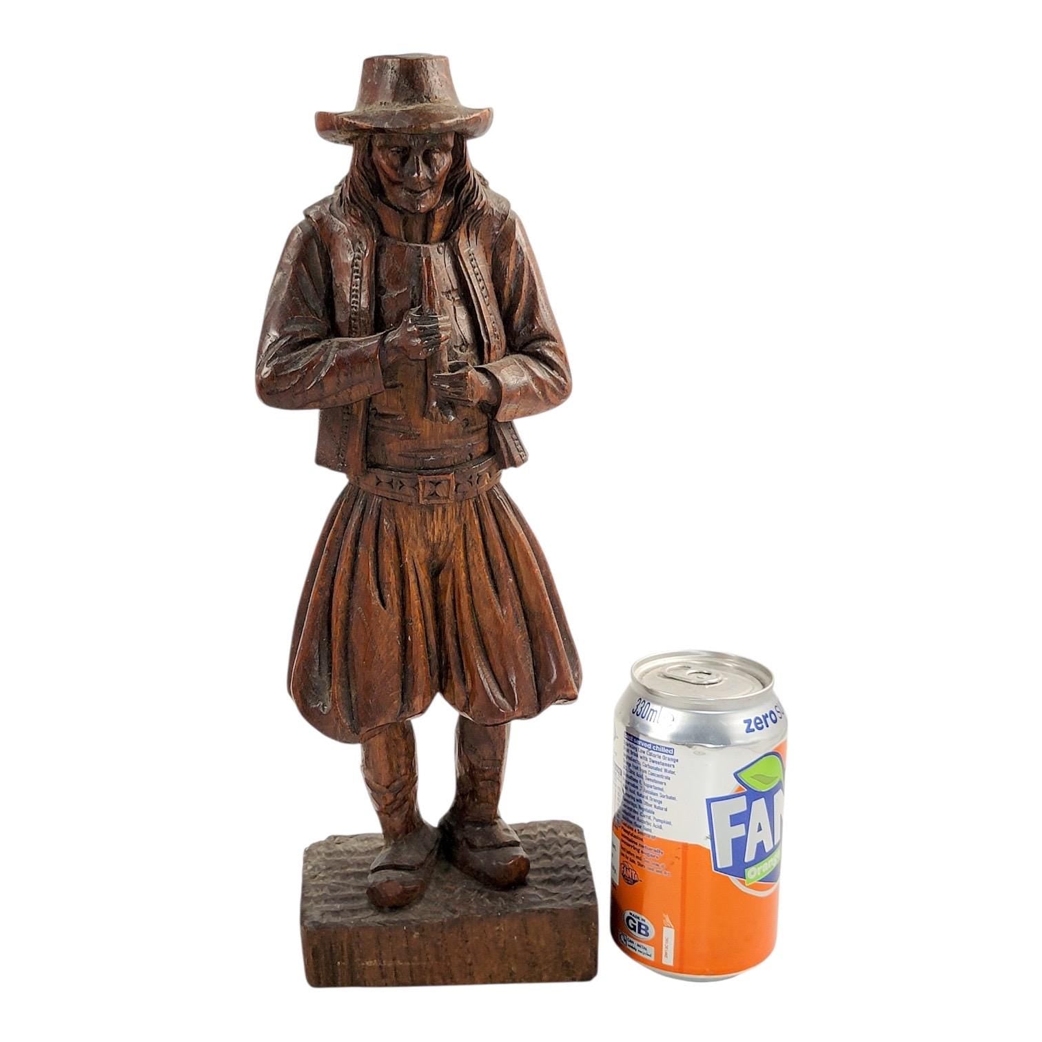 Antique Black Forest oak Pied Piper statue, 19th century German hand-carved folklore figure, detailed wood sculpture home decor