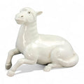 Hirado porcelain recumbent horse figurine, Mikawachi kilns Japanese white glazed sculpture, late Edo to Meiji period