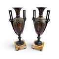 Pair of antique French Amphora vases, spelter with cherub relief, 19th century