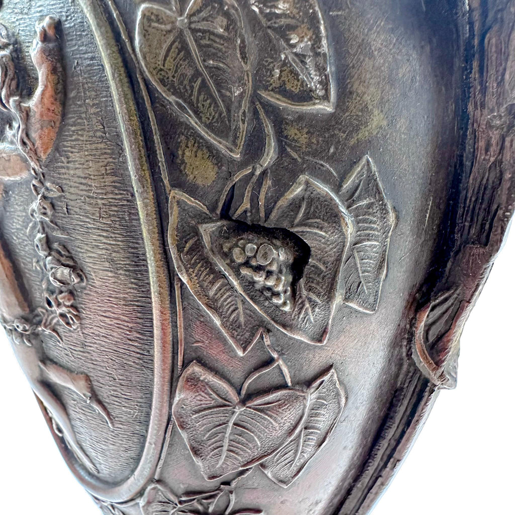 Pair of antique French Amphora vases, spelter with cherub relief, 19th century