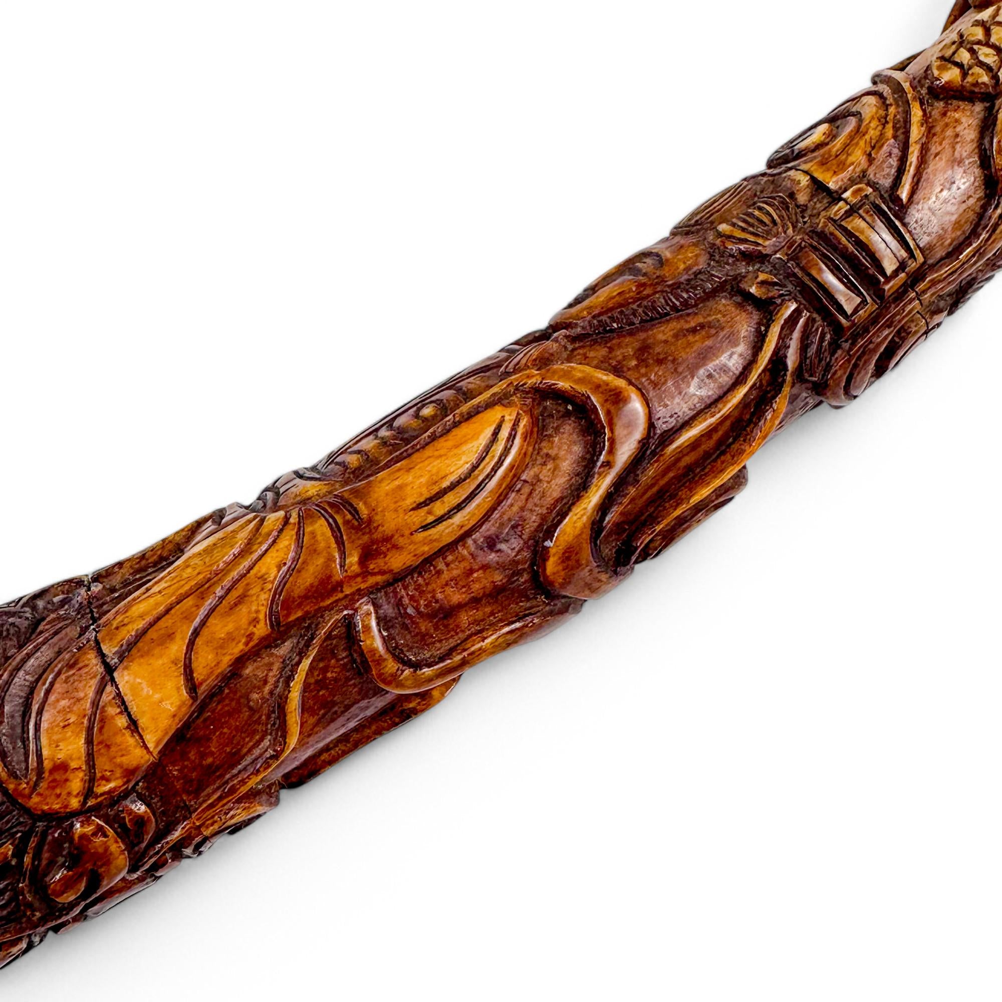 Antique Chinese carved bone ceremonial pipe with Guanyin & dragon, c.1880