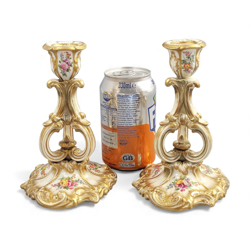Pair of Derby rococo porcelain candlesticks c.1825–1830, hand-painted floral cups