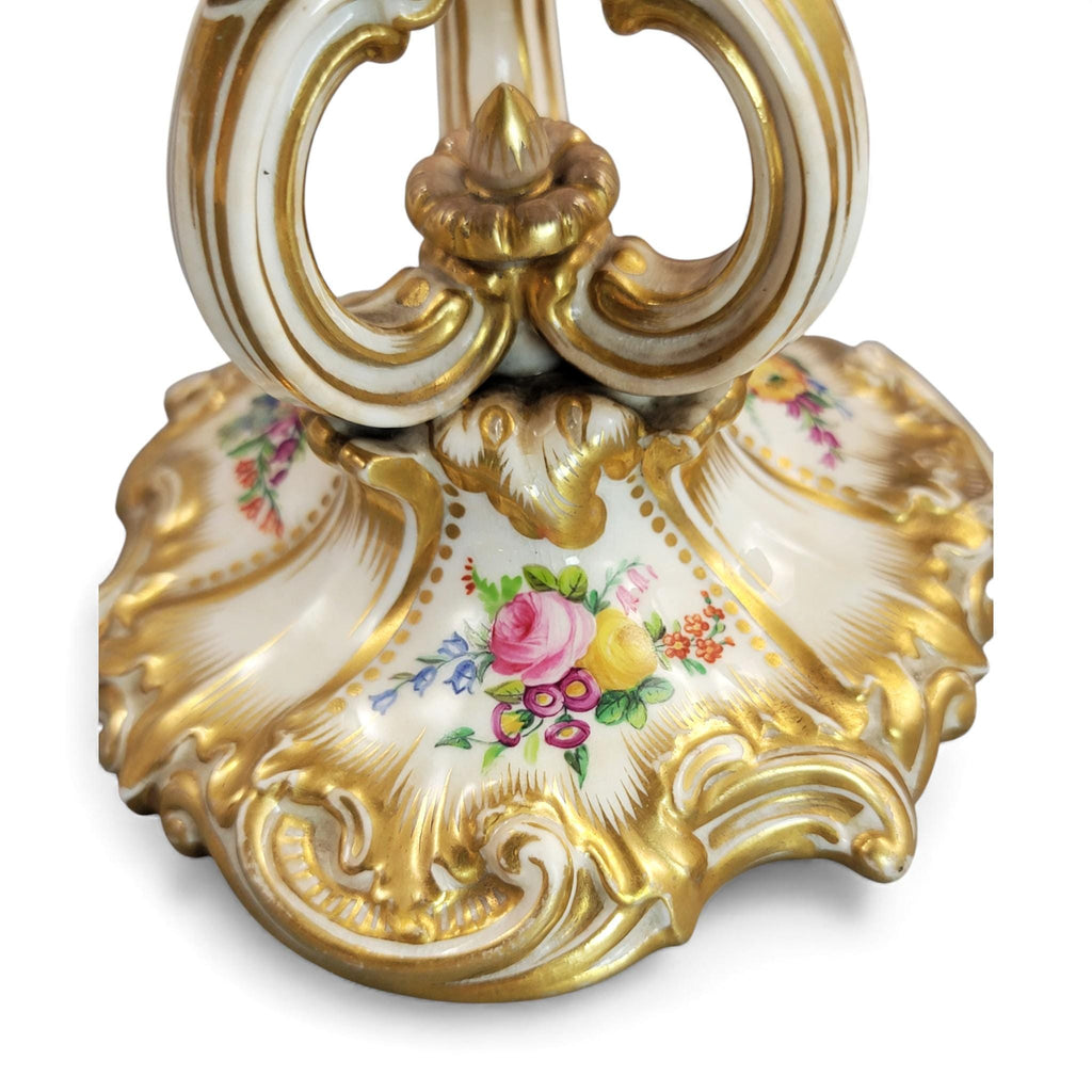 Pair of Derby rococo porcelain candlesticks c.1825–1830, hand-painted floral cups