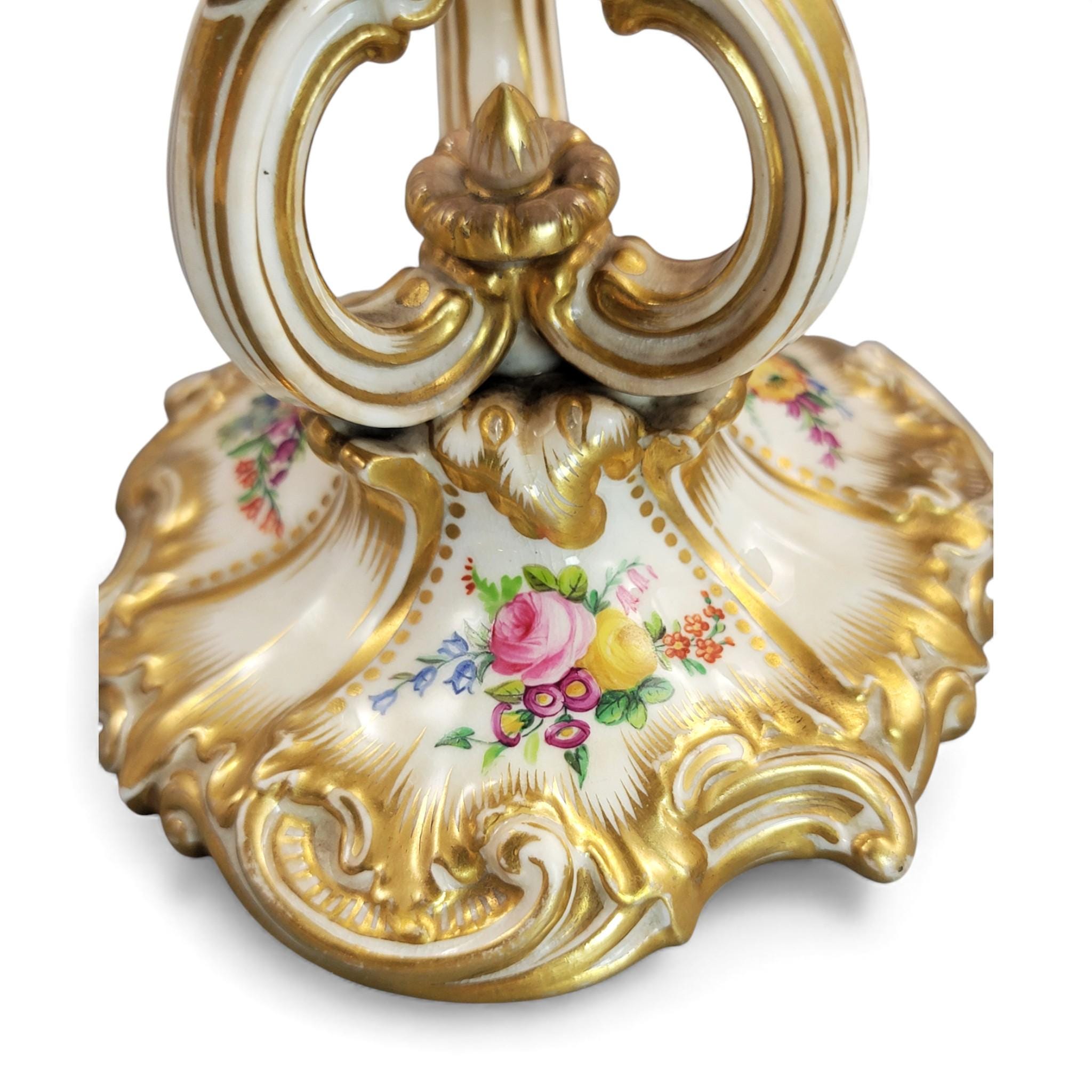 Pair of Derby rococo porcelain candlesticks c.1825–1830, hand-painted floral cups