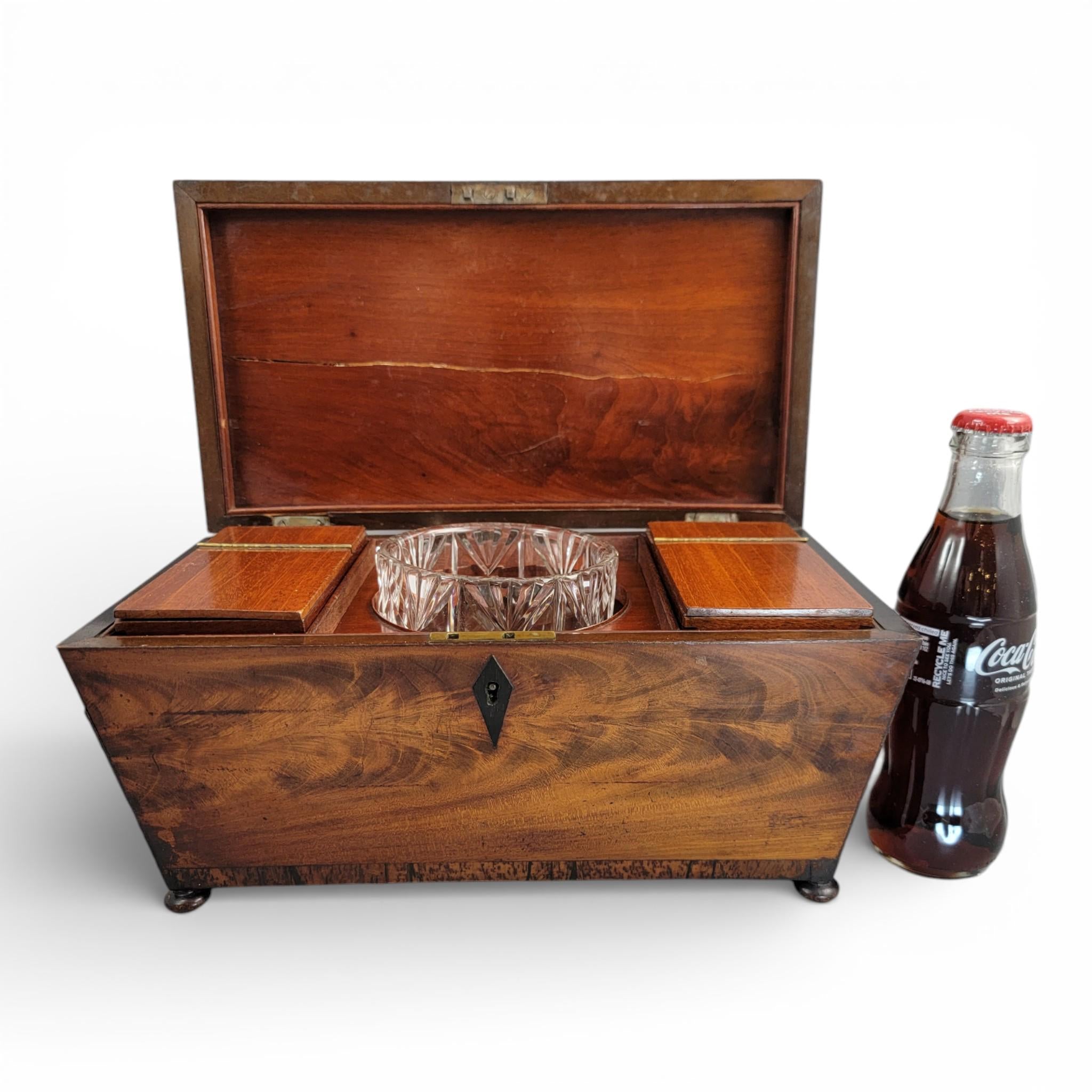Antique English Regency mahogany tea caddy with cut glass bowl, c. 1820–1835