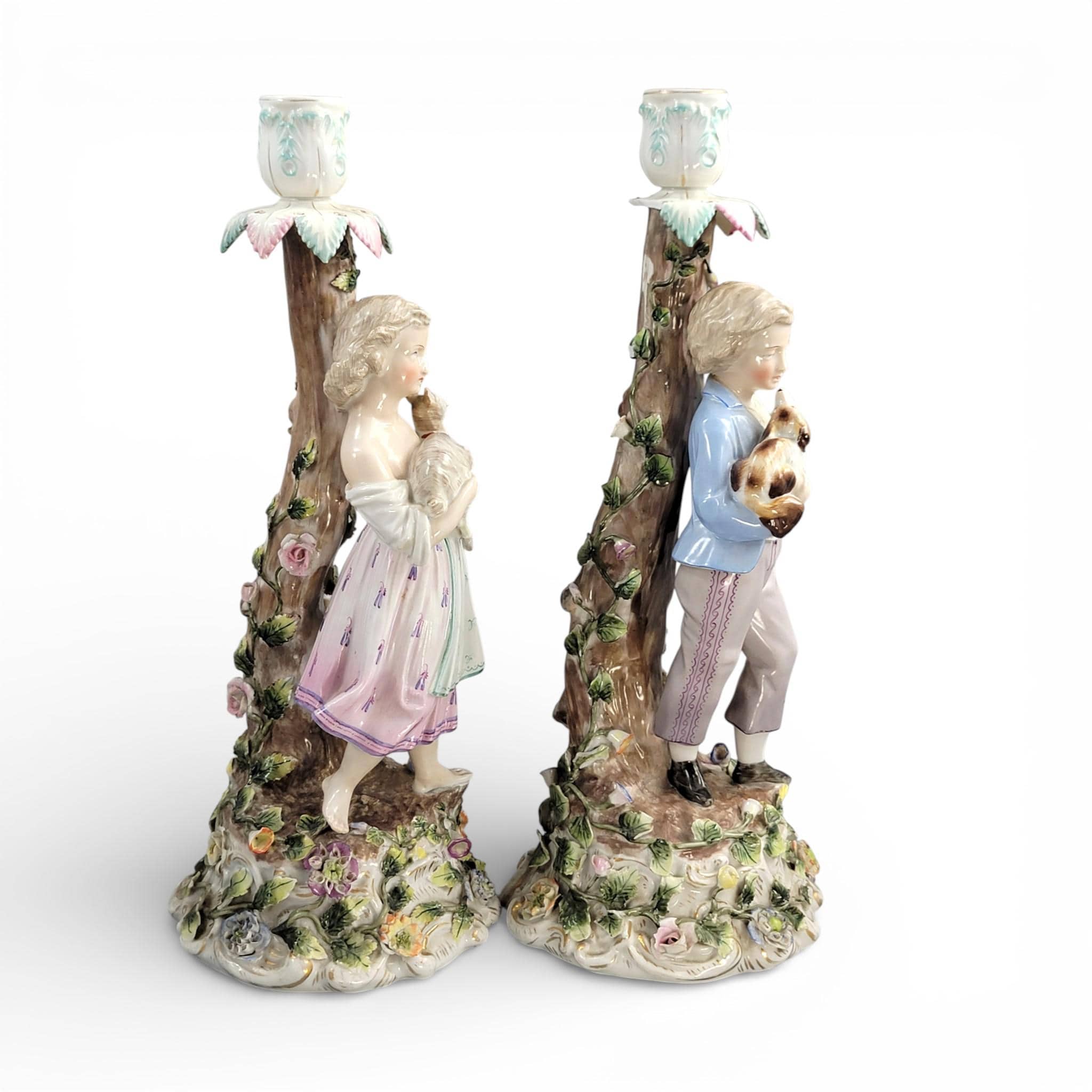 Antique Sitzendorf porcelain figural candlesticks with boy and girl, Germany c.1890