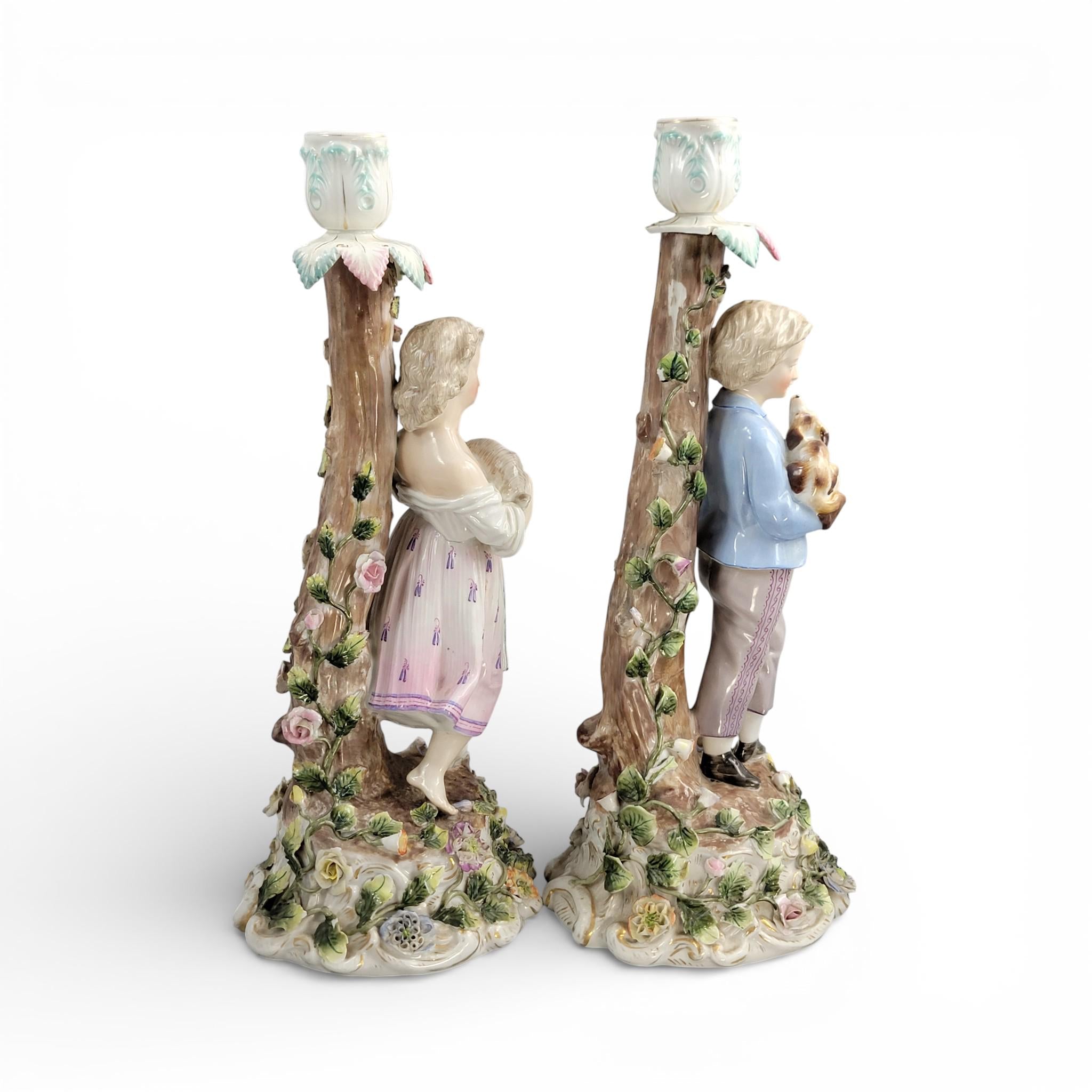 Antique Sitzendorf porcelain figural candlesticks with boy and girl, Germany c.1890