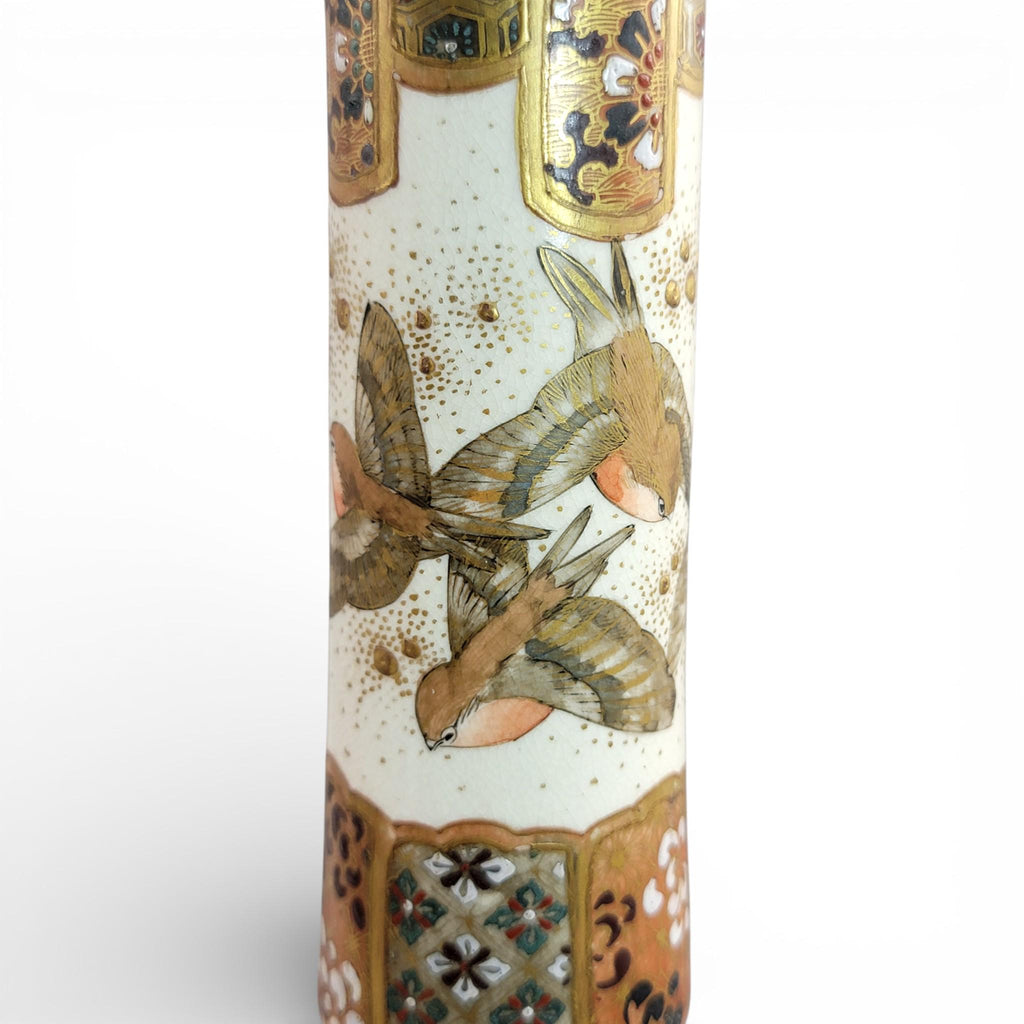 Rare pair of large Japanese Satsuma vases of elongated bottle form, dating to the Meiji period and standing approximately 38 cm high.